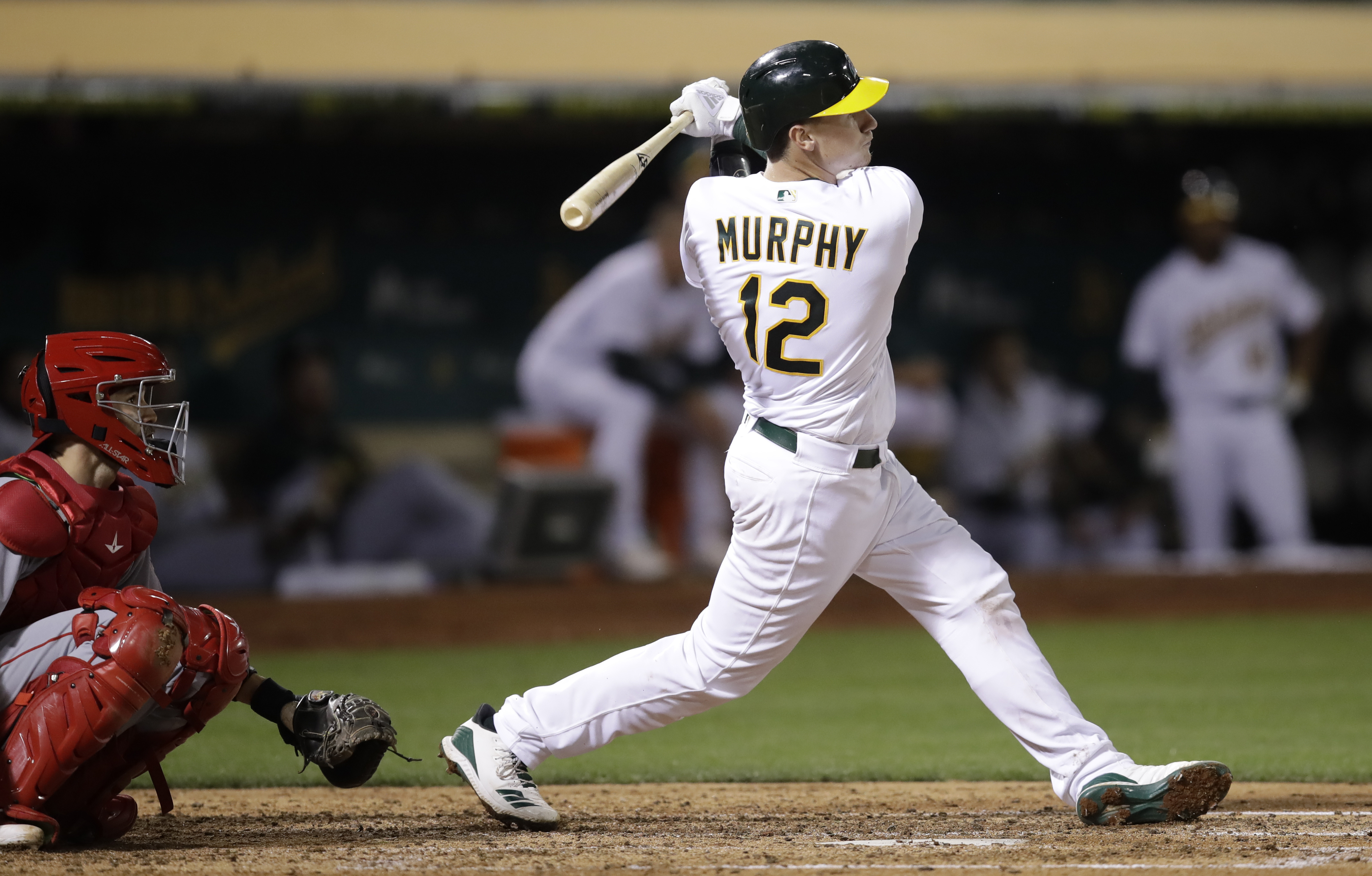 Murphy homers for 1st hit in MLB debut, A's blank Angels 4-0