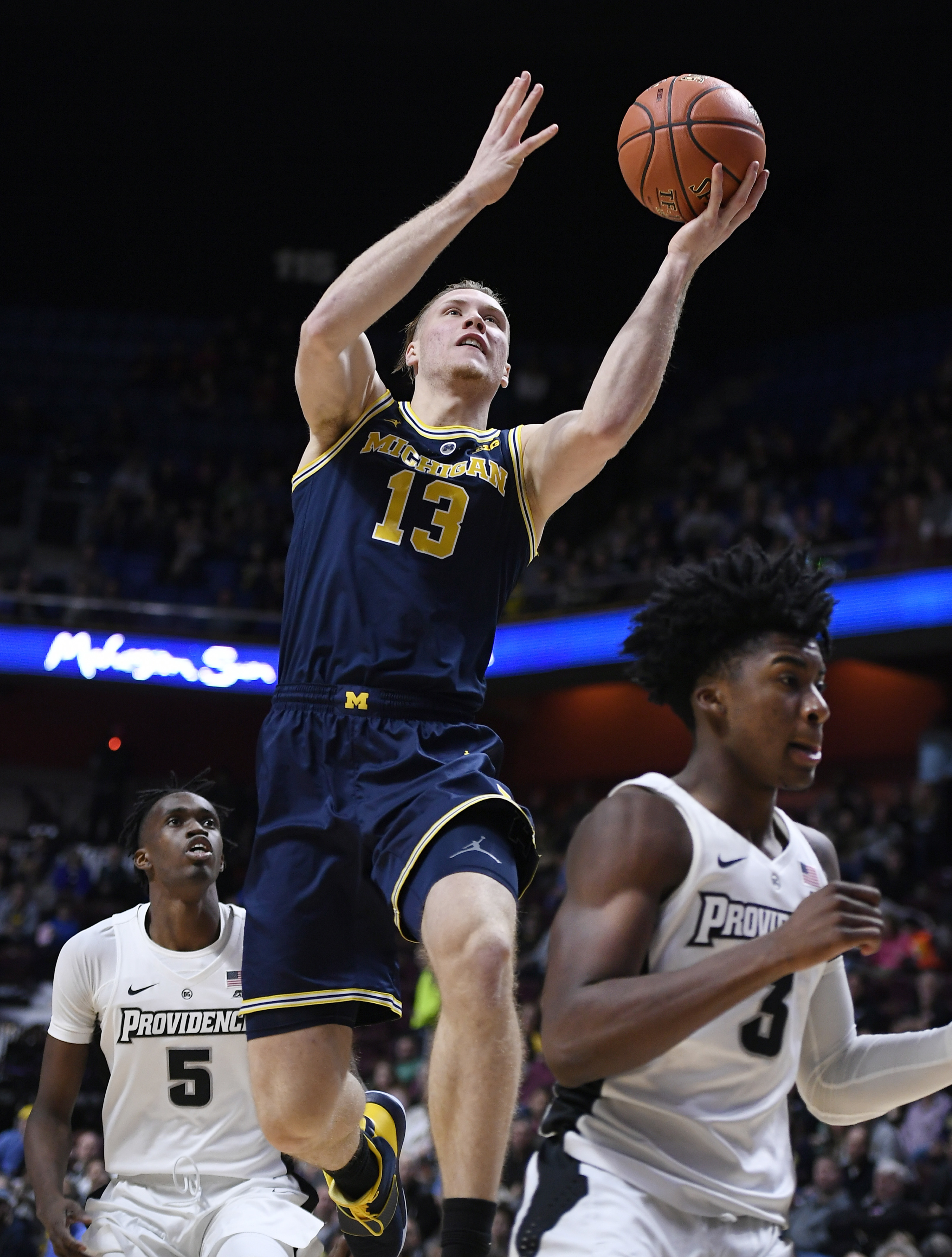 The Latest: Michigan beats Providence for Tip-Off title