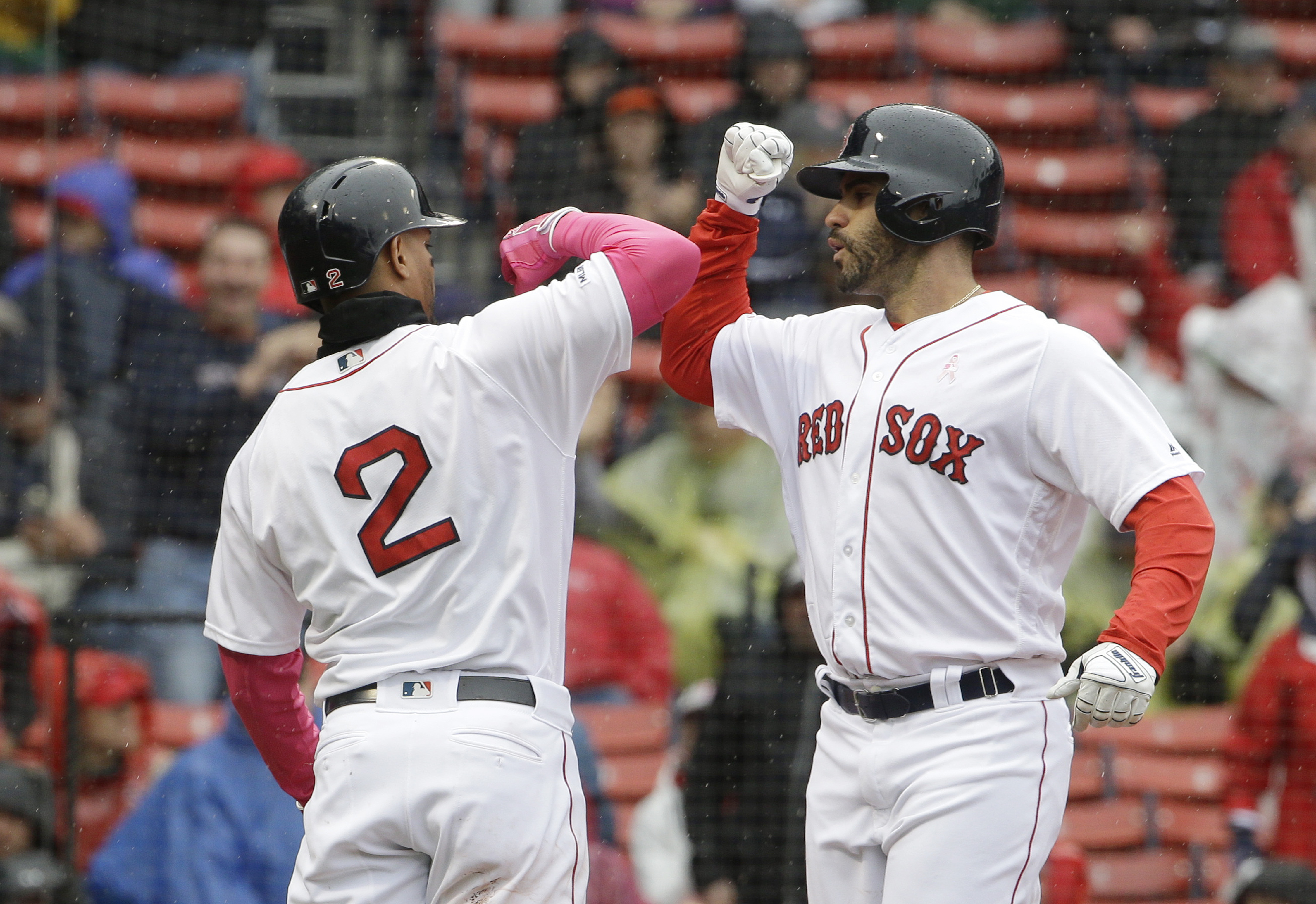 Martinez homers twice, surging Red Sox sweep Mariners