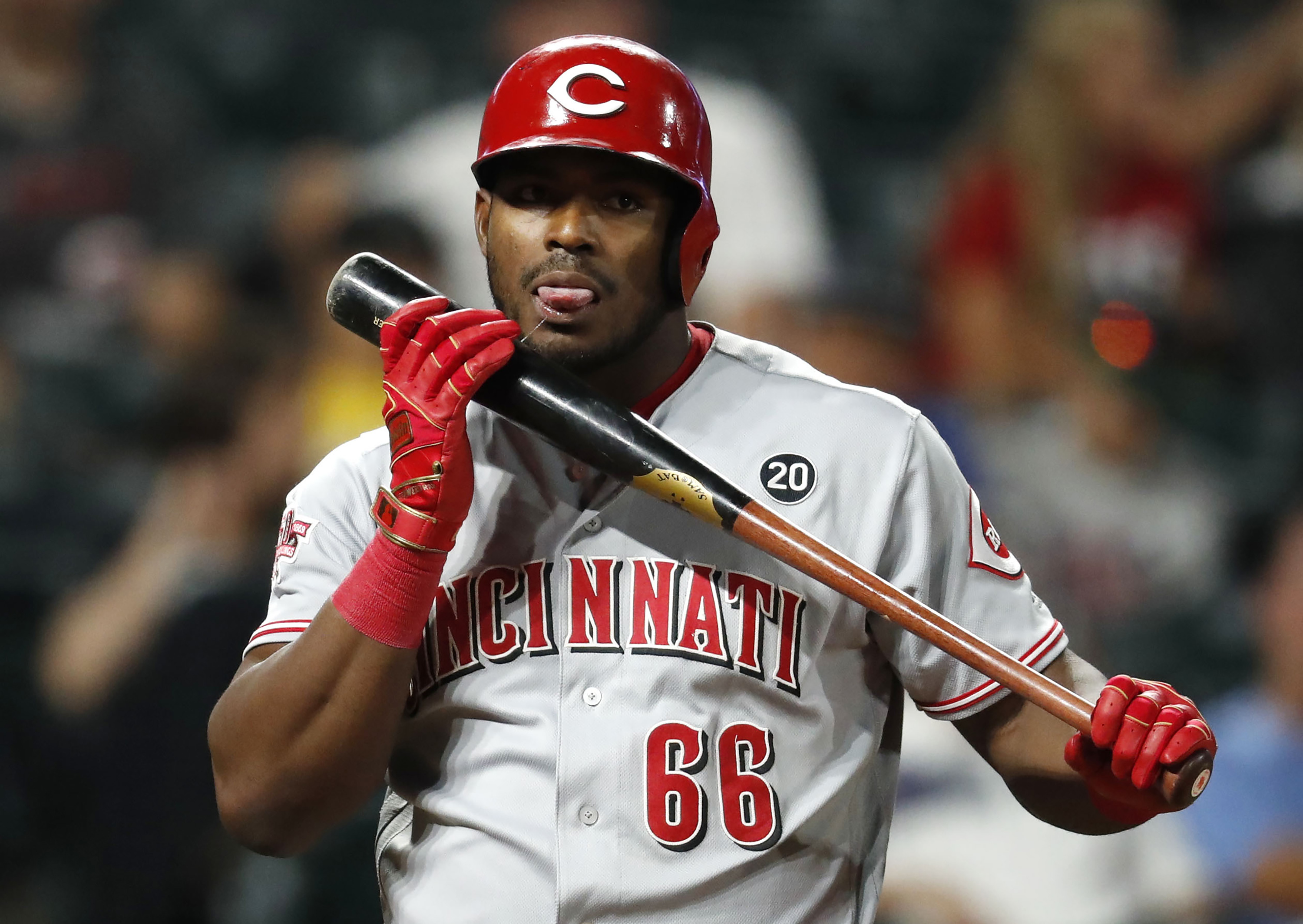 Ervin ties Reds' record with 6 hits in 17-9 win over Rockies