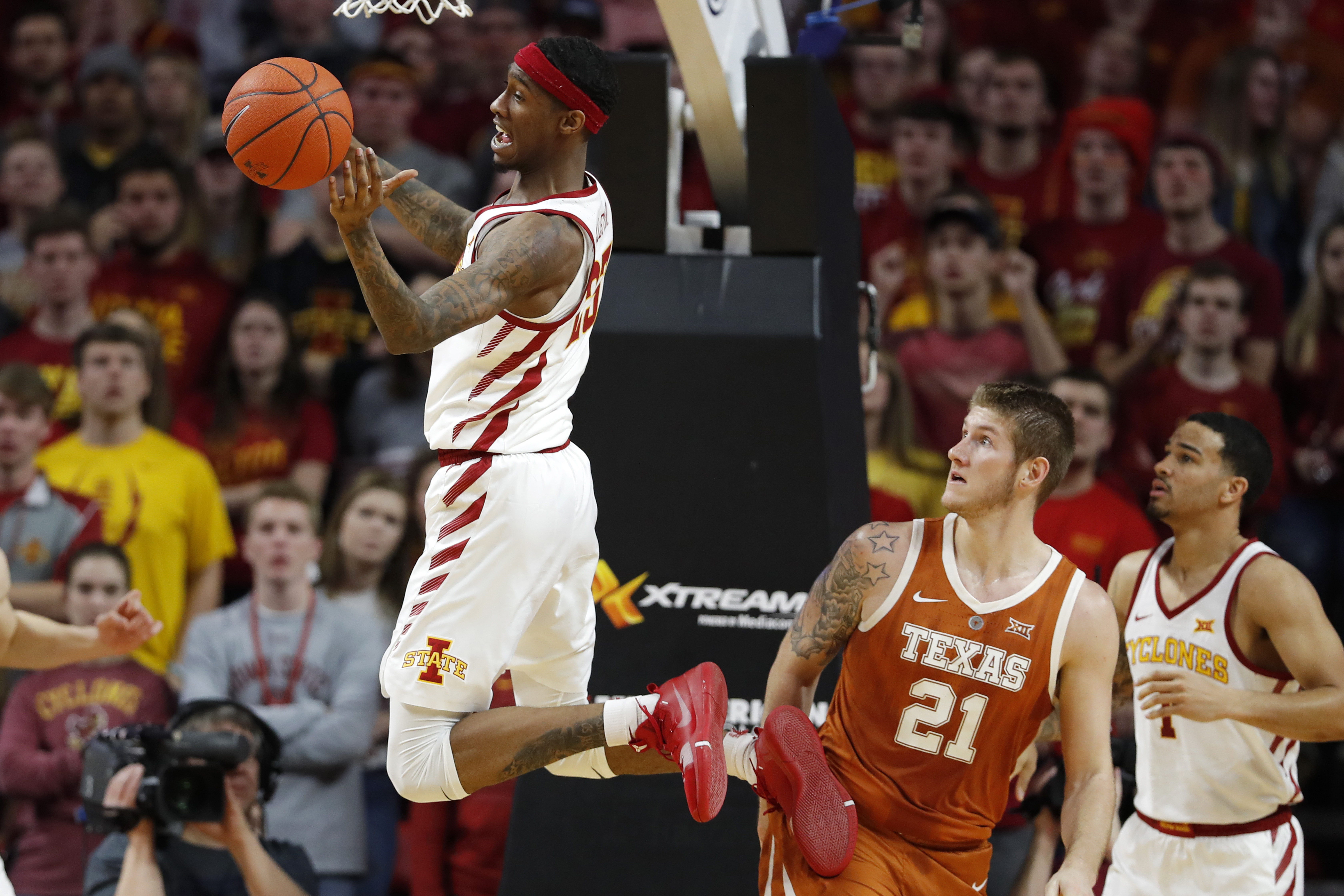No. 20 Iowa State holds off Texas 65-60