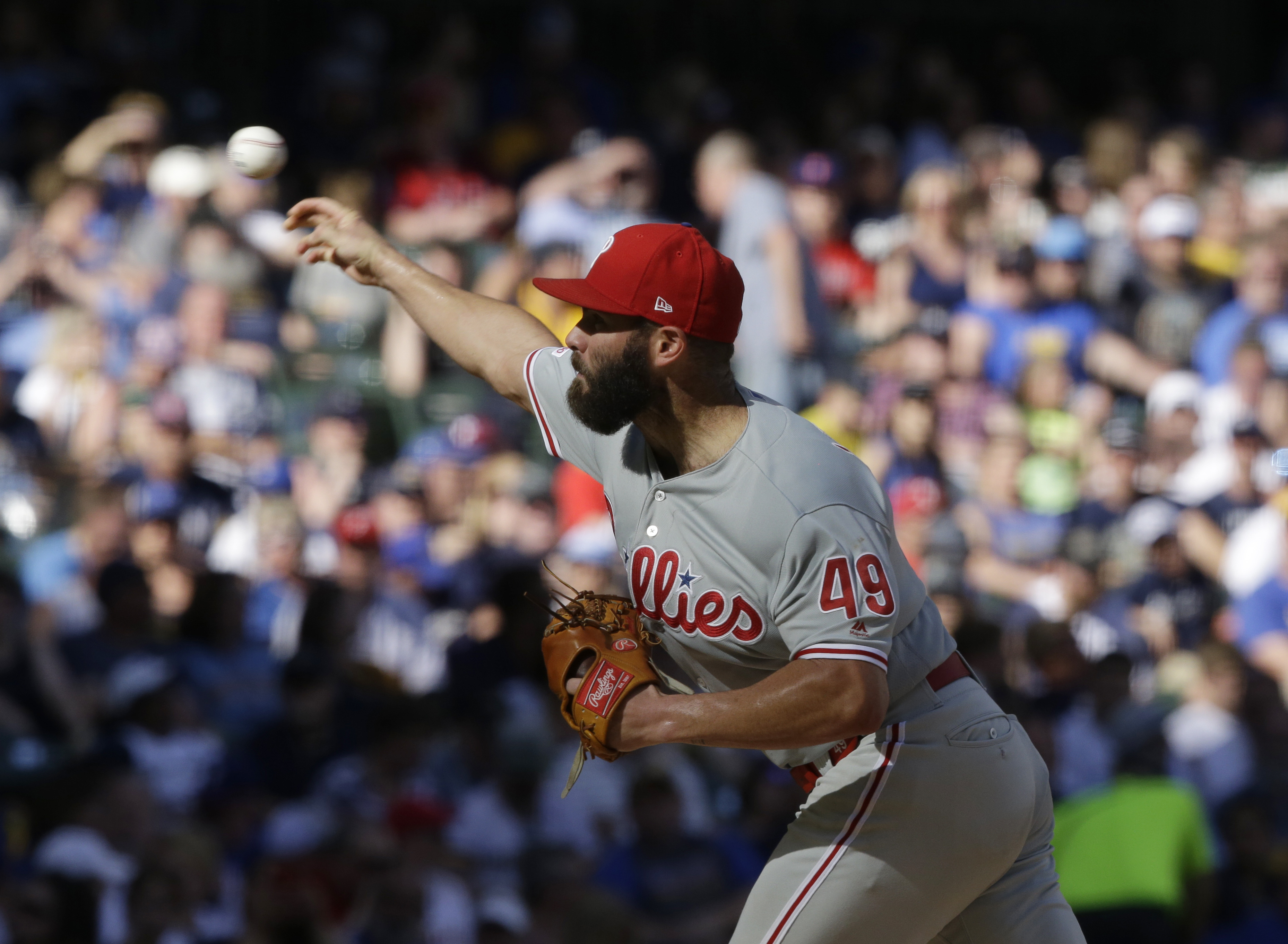 Phillies get 4 HRs, strong outing by Arrieta to beat Brewers