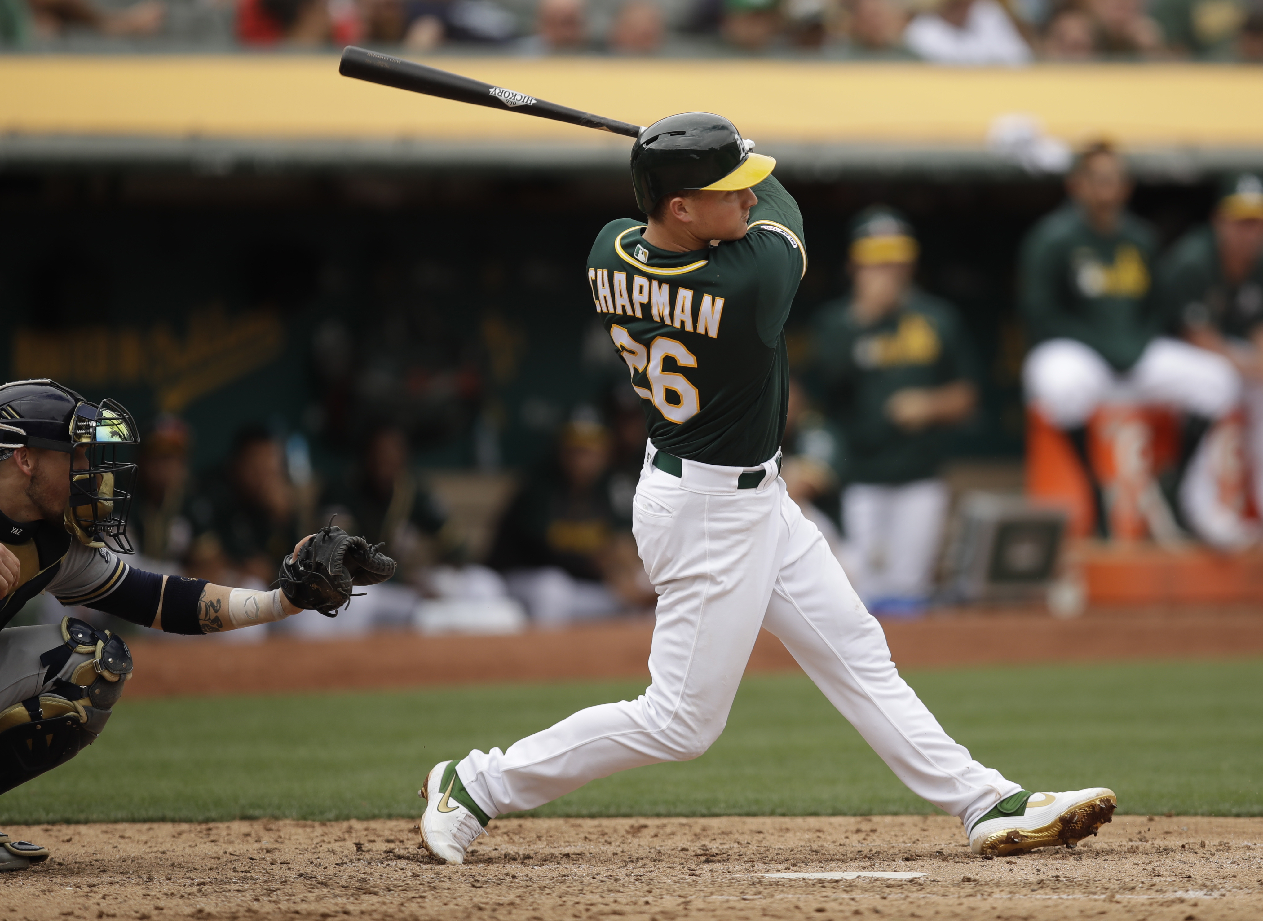 Chapman rallies A's past Brewers with two-run HR off Hader