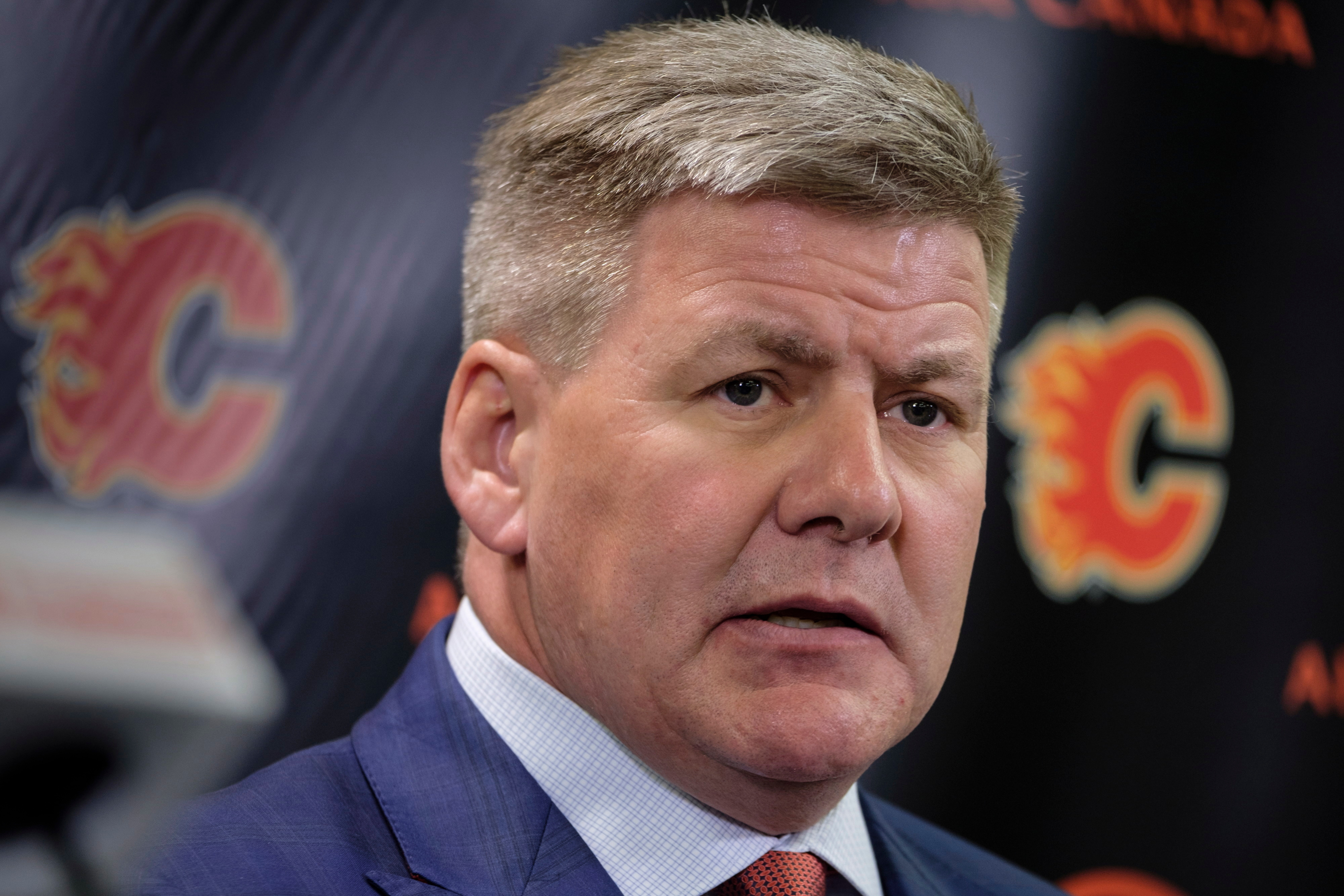 Flames coach Bill Peters quits; accused of slurs, abuse