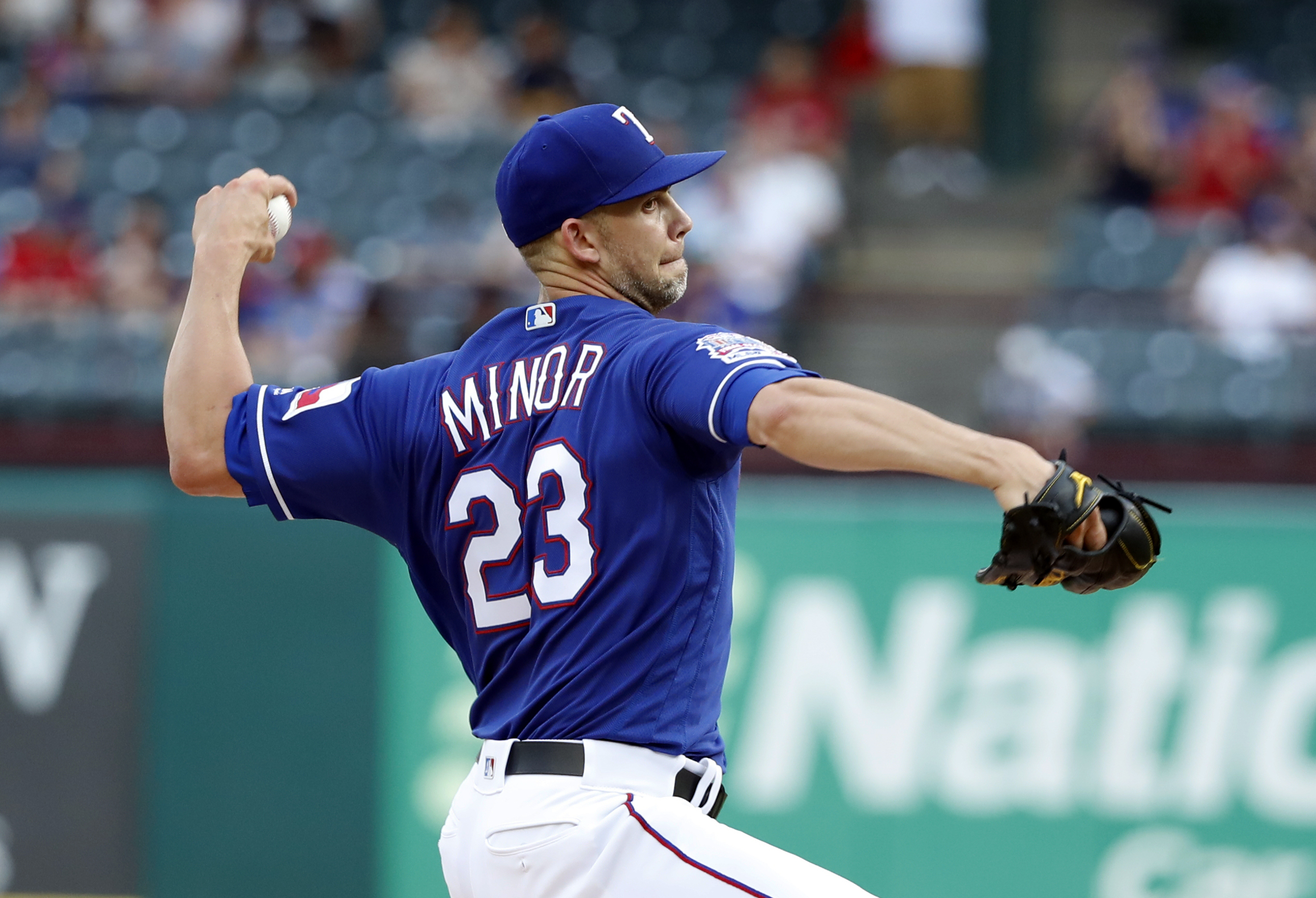 Minor 11 Ks, Rangers 5 homers in 10-9 win over Mariners