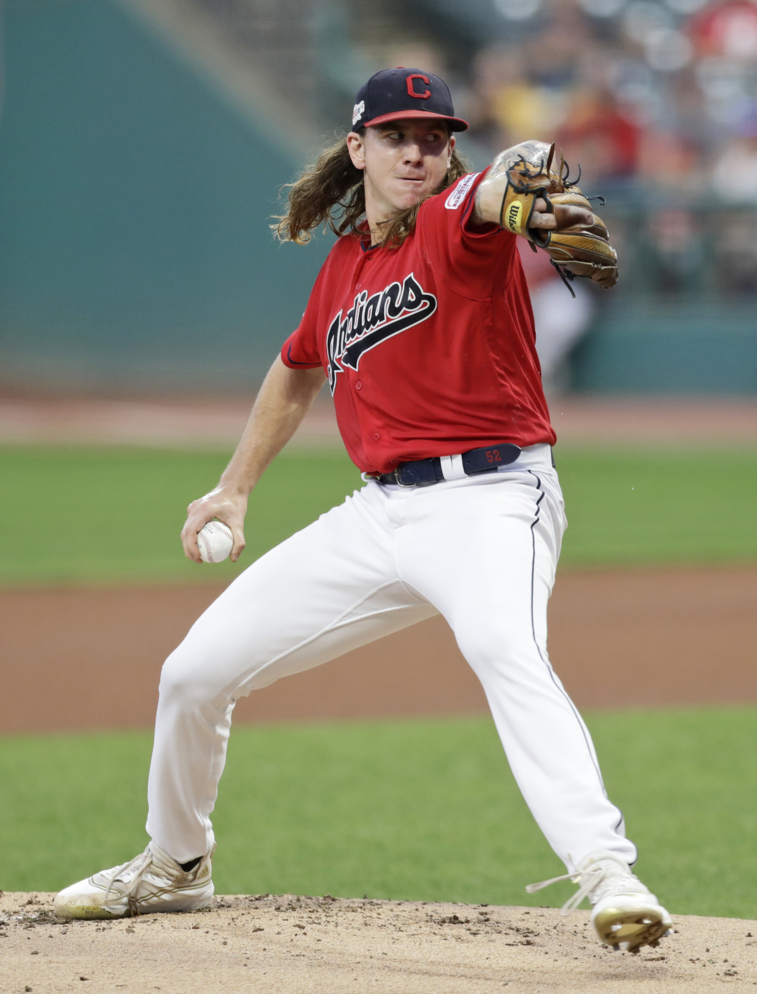 Indians move into a tie for wild-card spot, beat Tigers 7-0