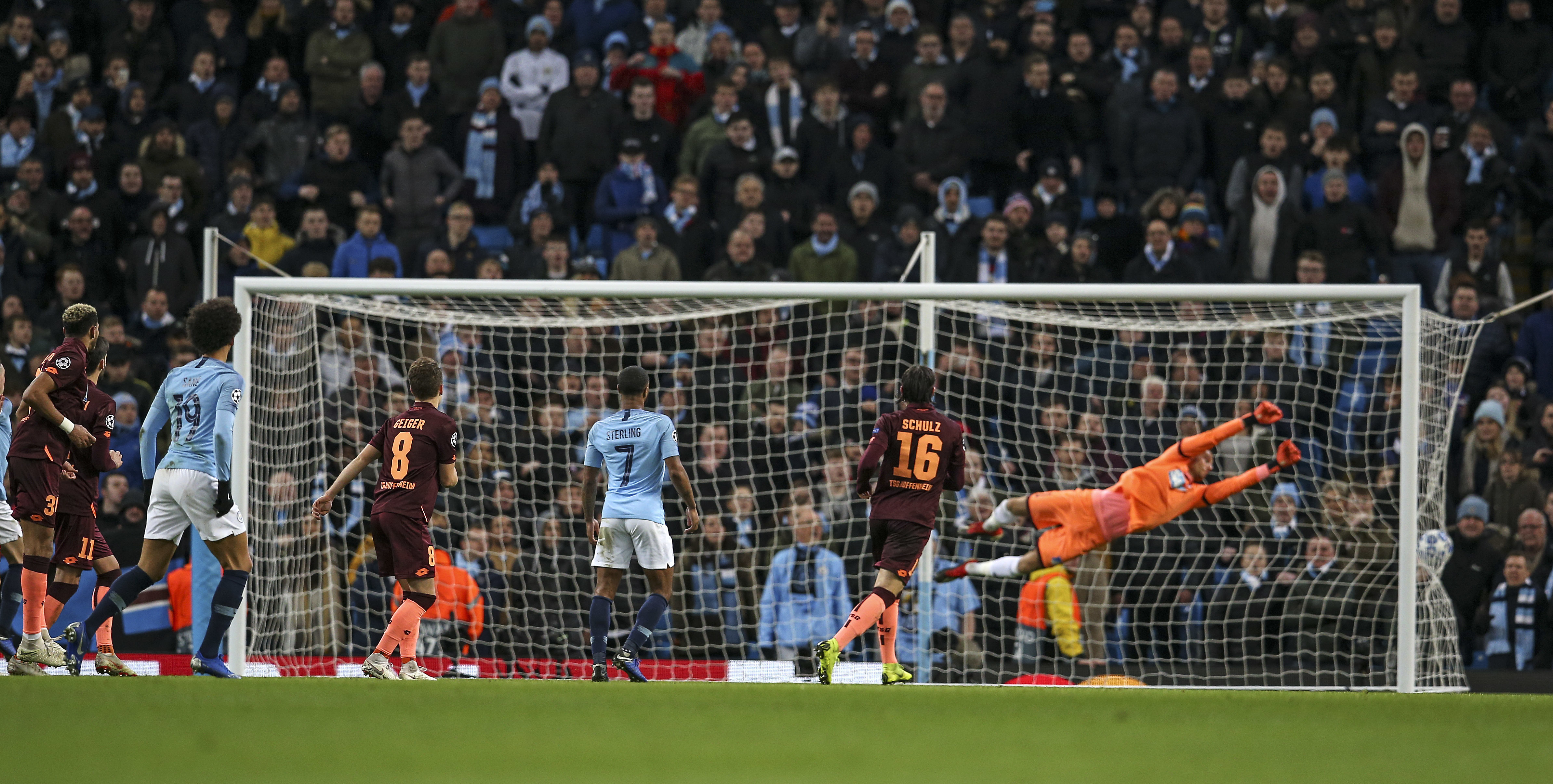 Sane double earns Man City 2-1 win, top spot in CL group