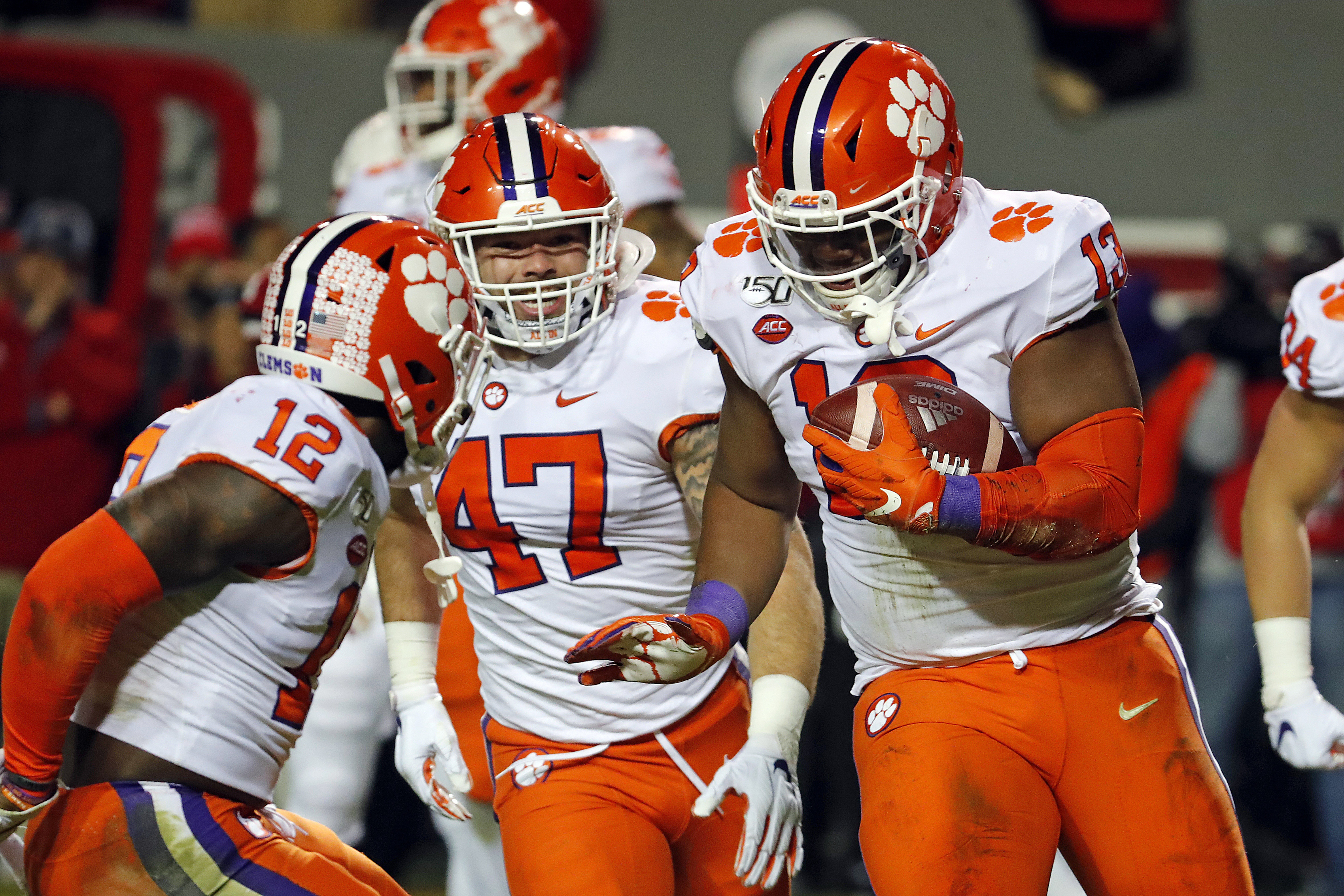 No. 4 Clemson tops NC State 55-10, wins ACC division title