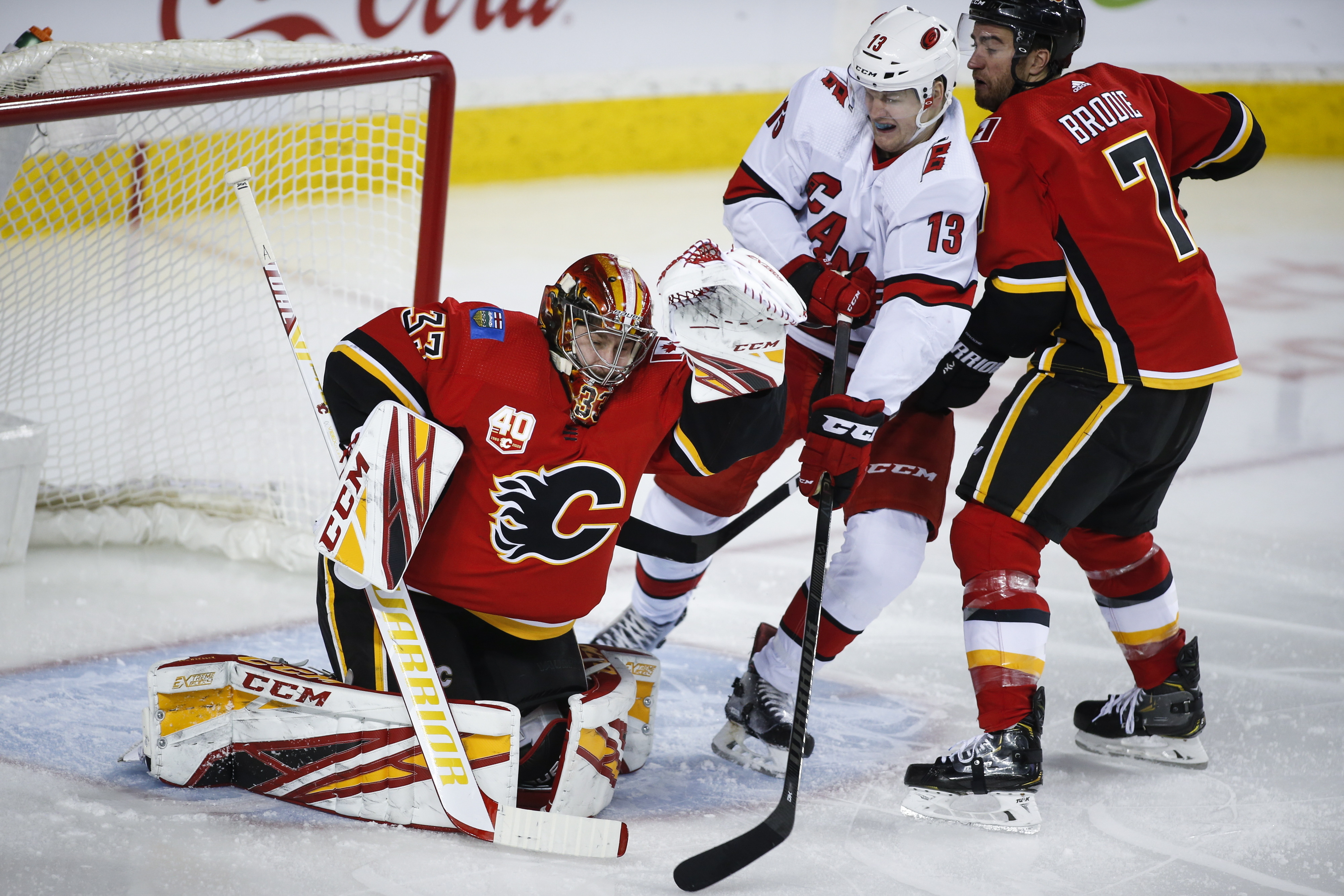 Canes end Flames' 7-game win streak; Isles top Sabres in OT