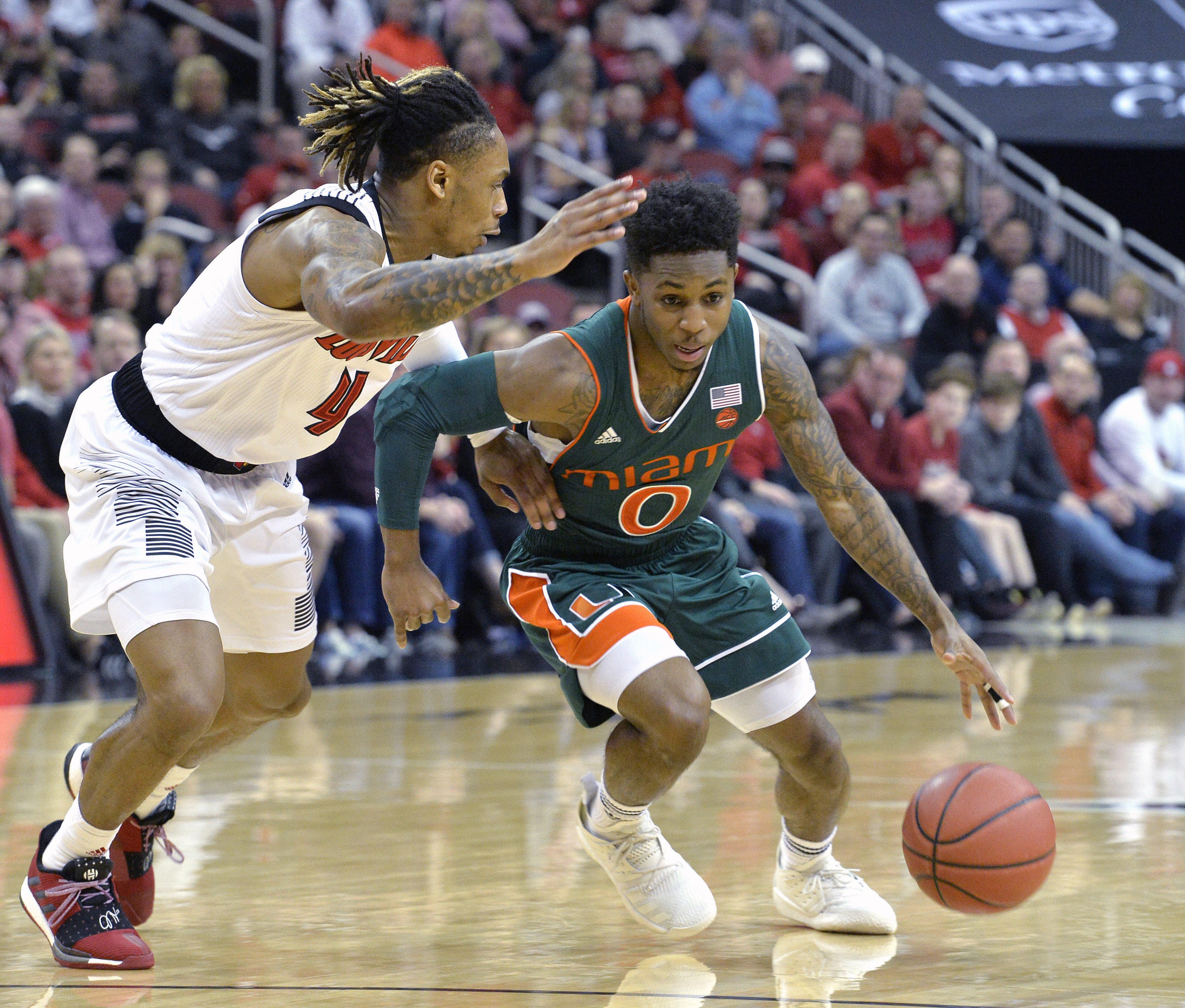 Louisville rallies to wear down Miami 90-73 in ACC play