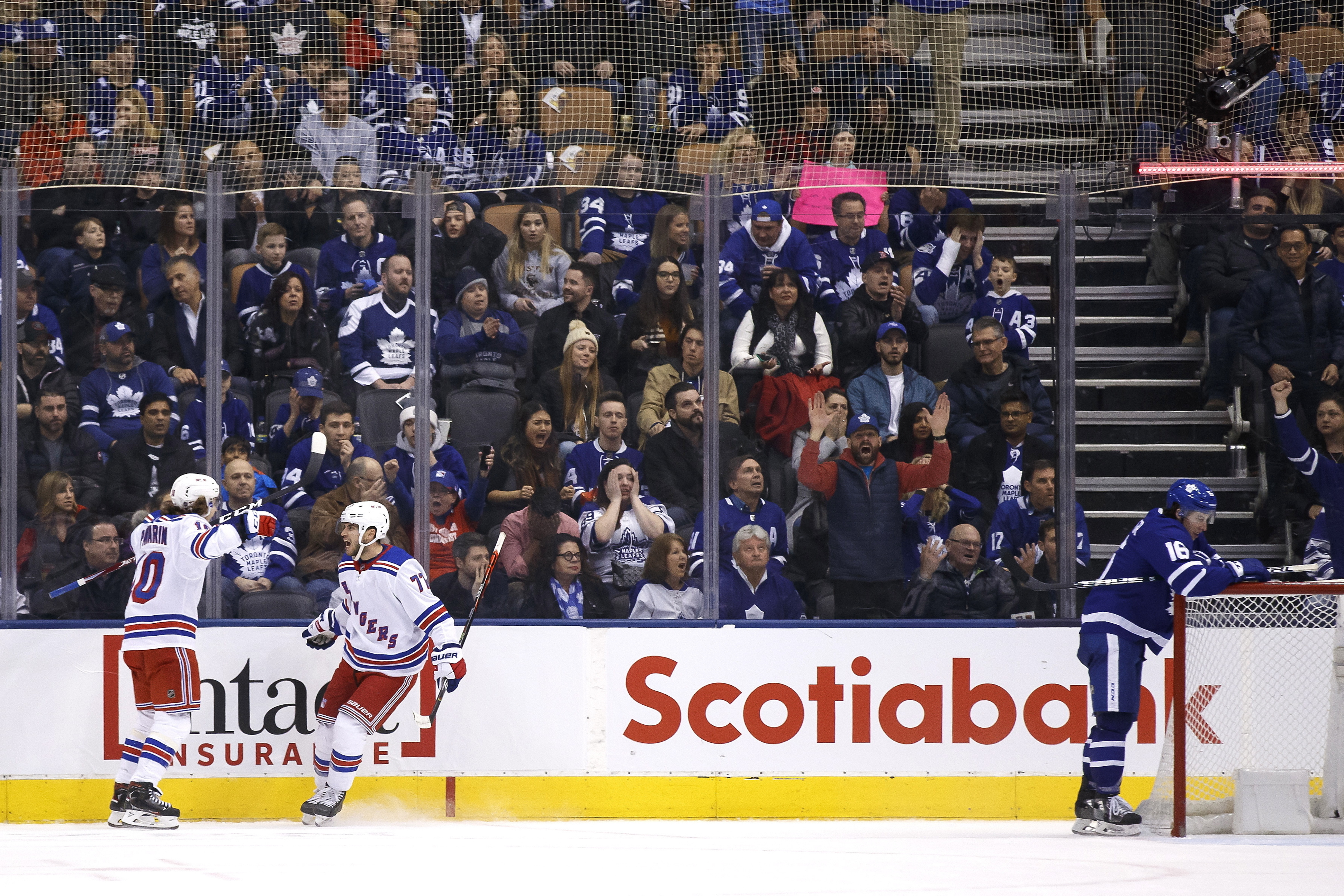 DeAngelo scores in OT, Rangers beat Maple Leafs 5-4