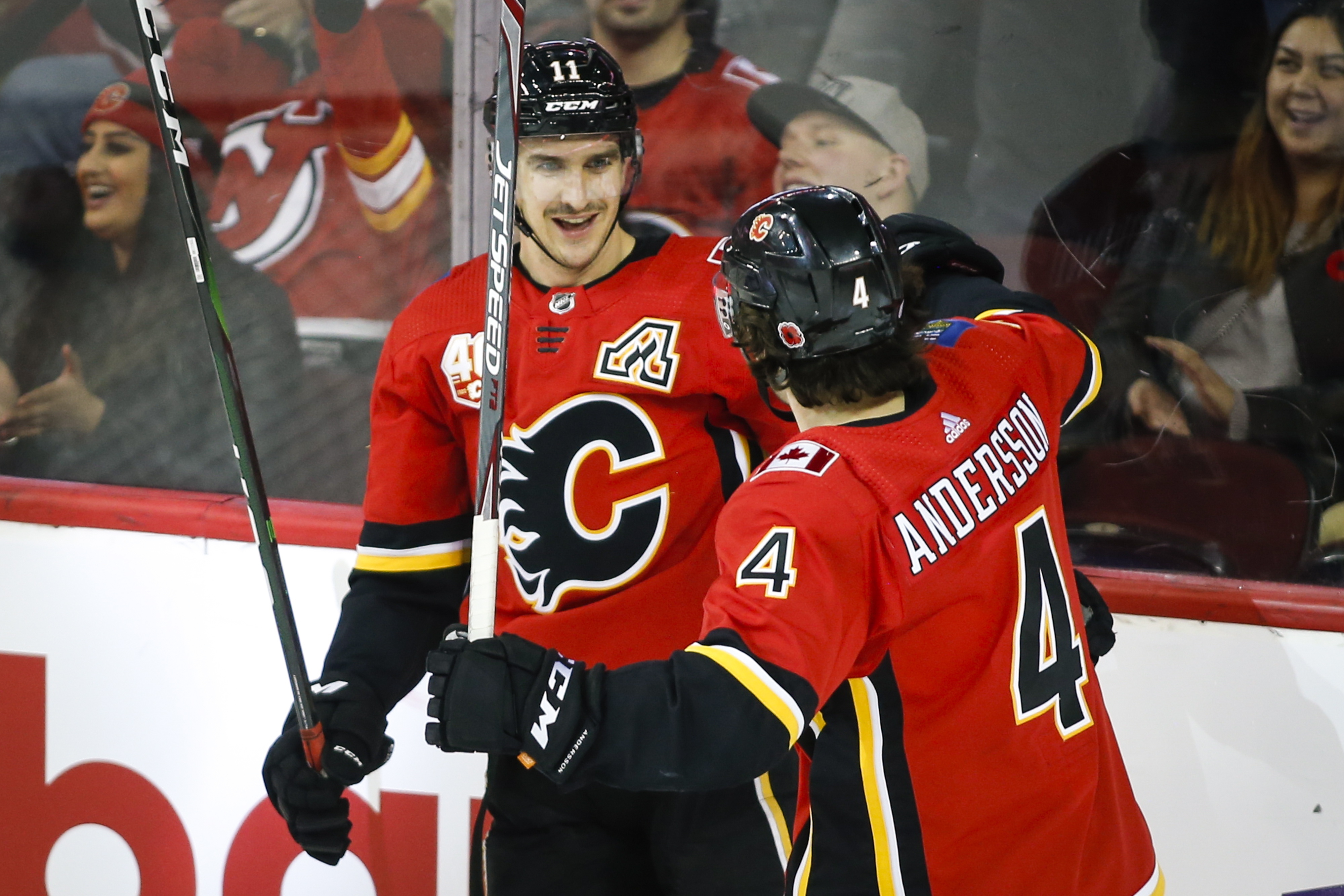 Hanifin has goal, 2 assists, Flames rally past Devils 5-2