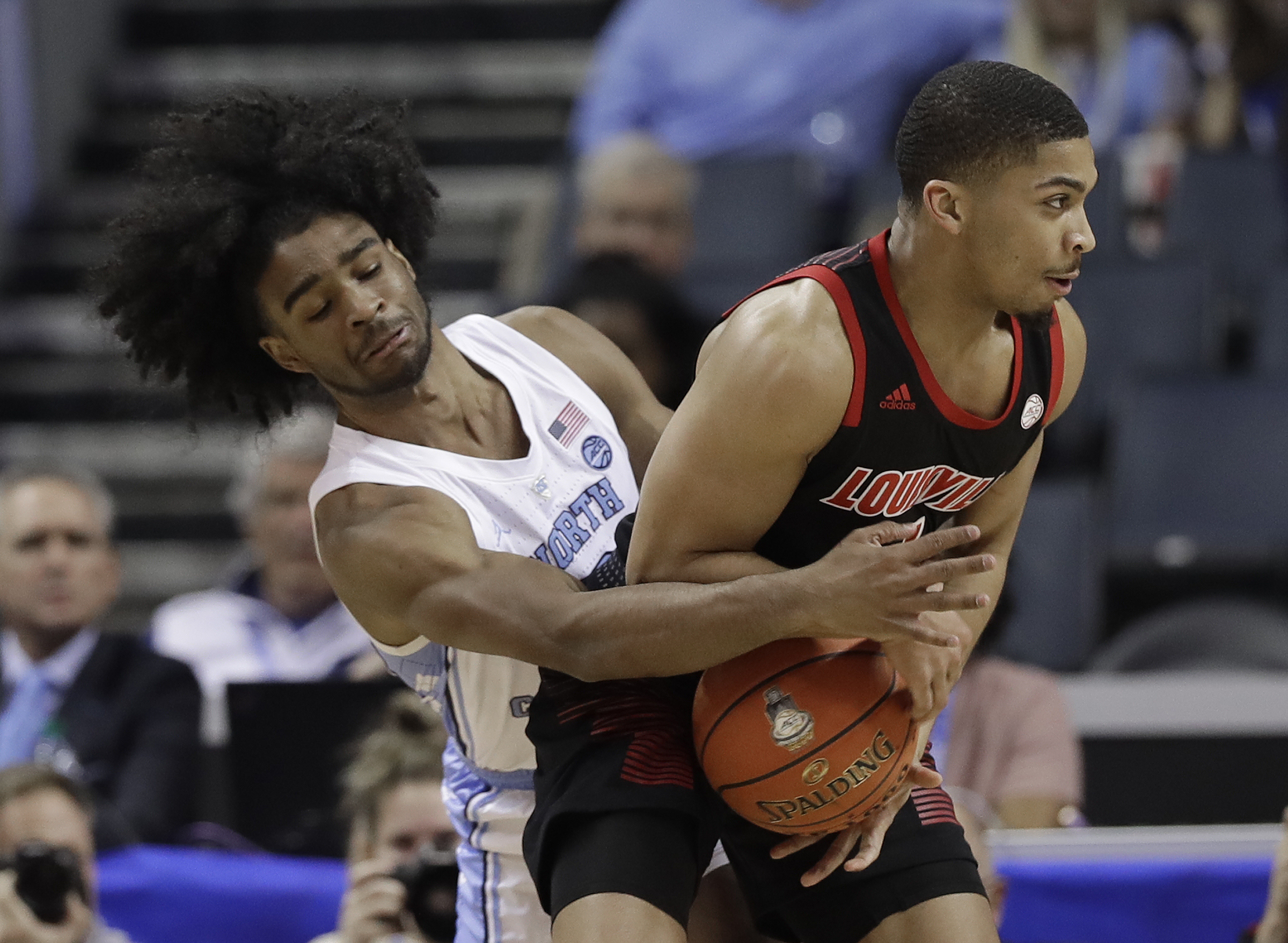 No. 3 North Carolina beats Louisville 83-70 in ACC quarters