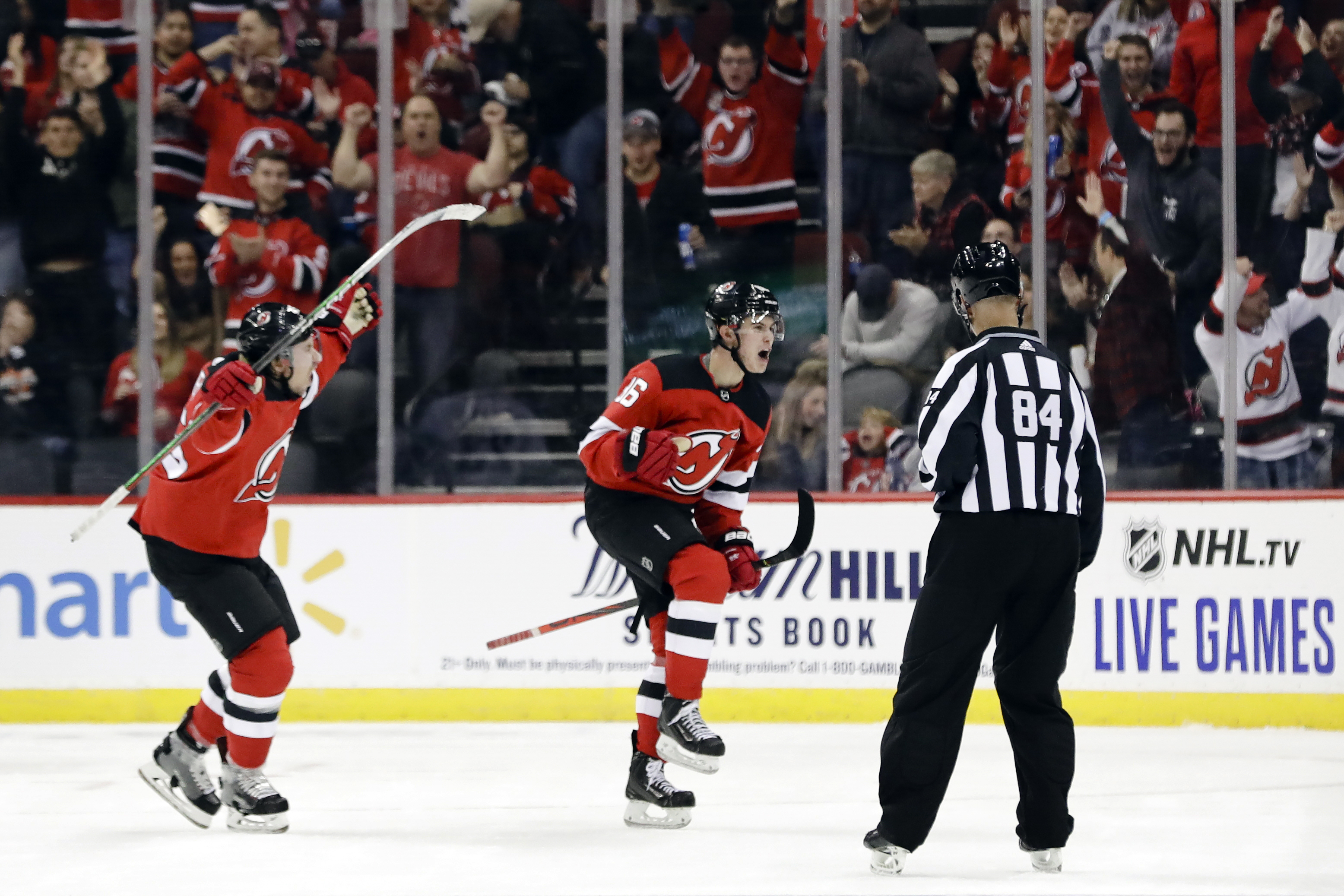 Hughes scores 1st NHL goal in Devils' 1-0 win over Canucks