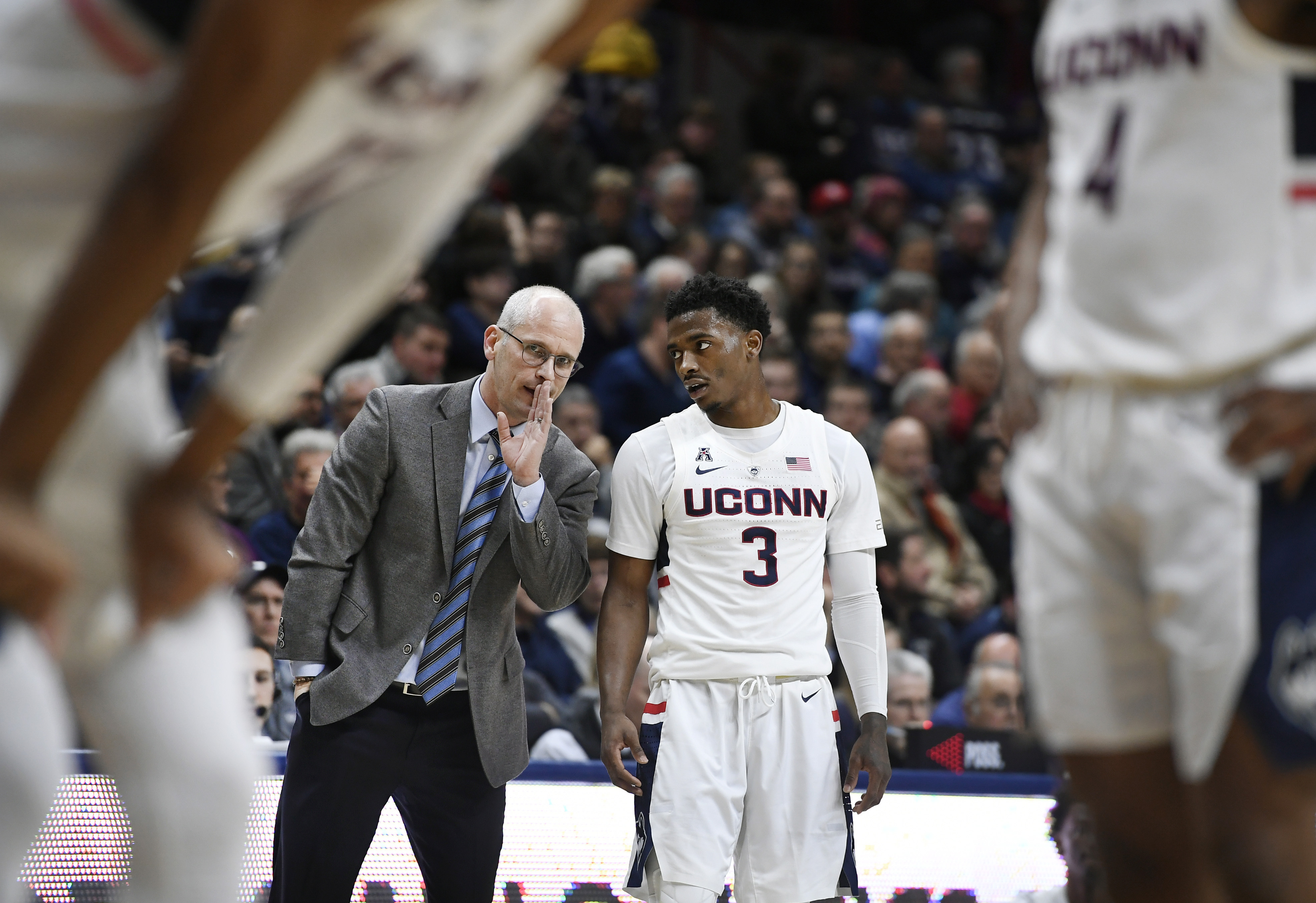 Adams, Gilbert lead UConn past SMU 76-64