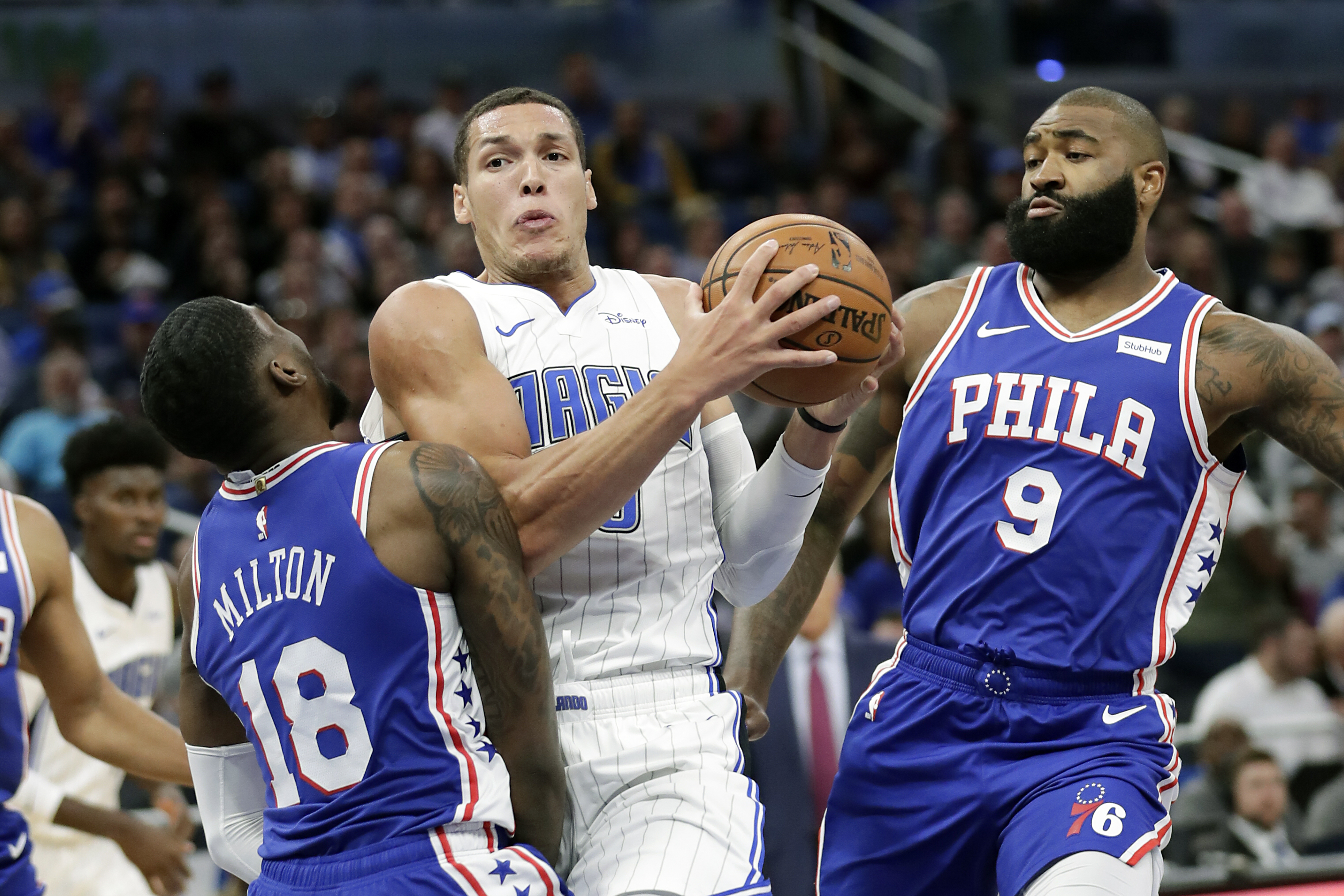 Vucevic, big 4th quarter sent Magic past 76ers 112-97