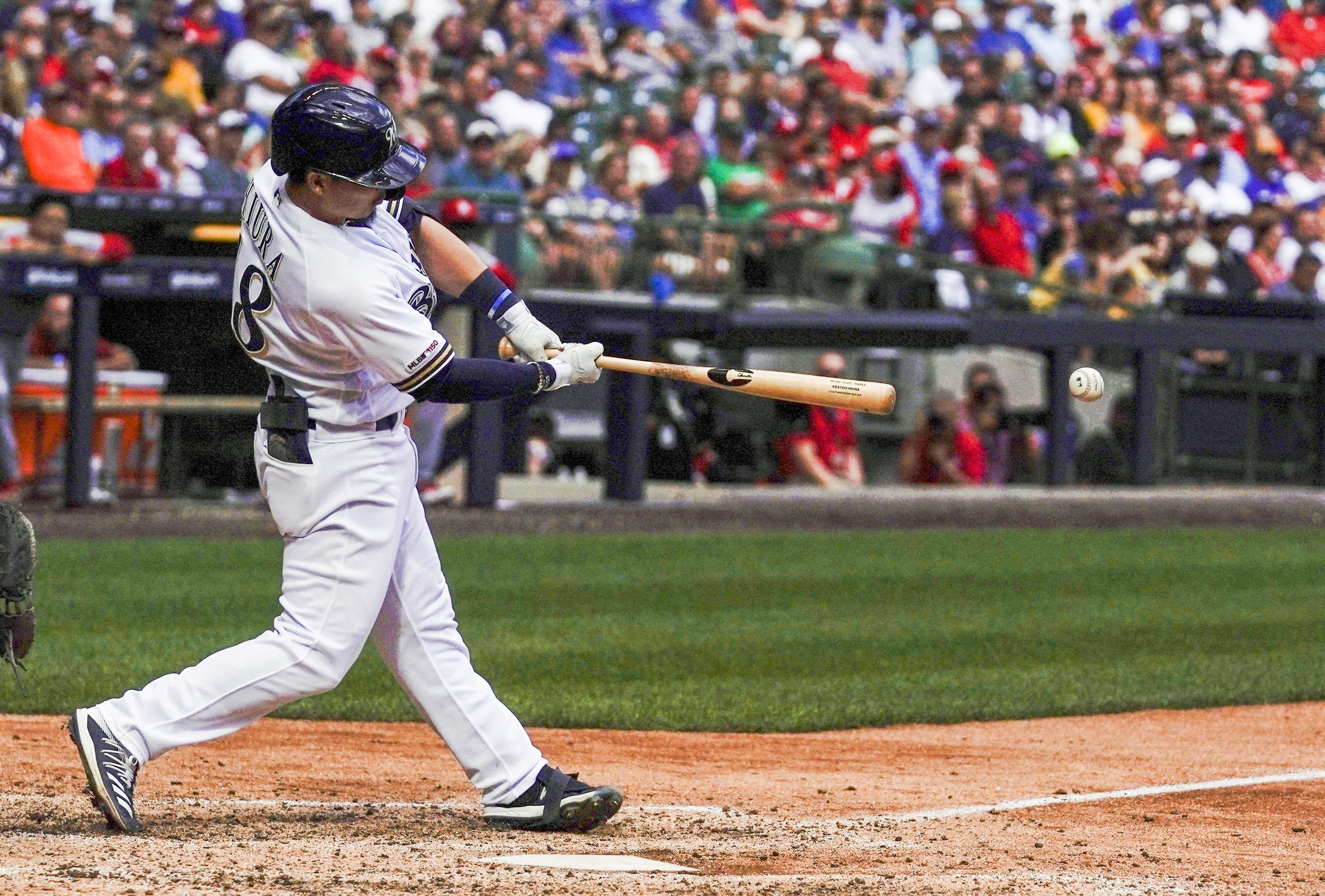 Hiura, Lyles help Brewers stop Cardinals' 6-game win streak