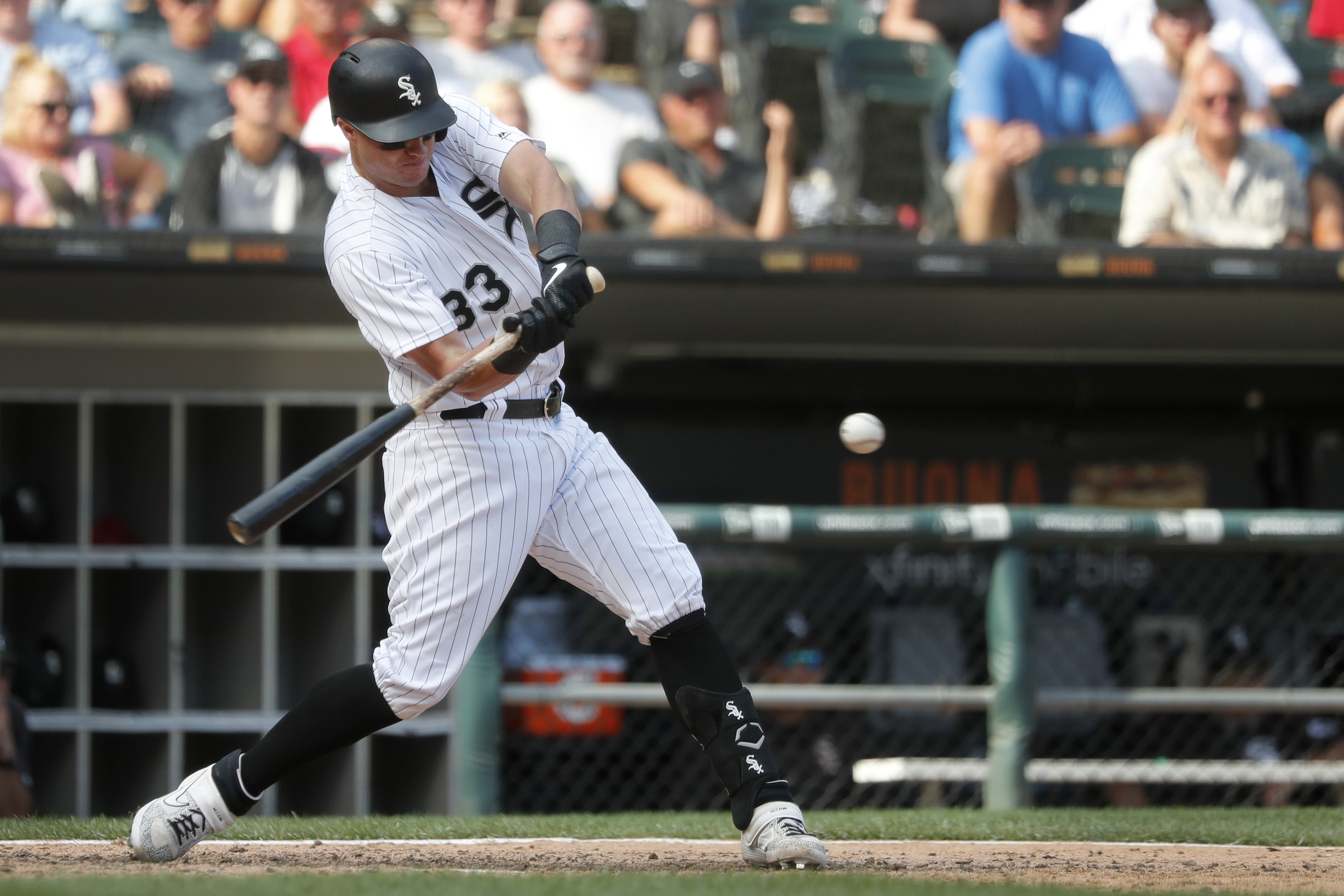 McCann grand slam in 8th powers White Sox past Astros 13-9