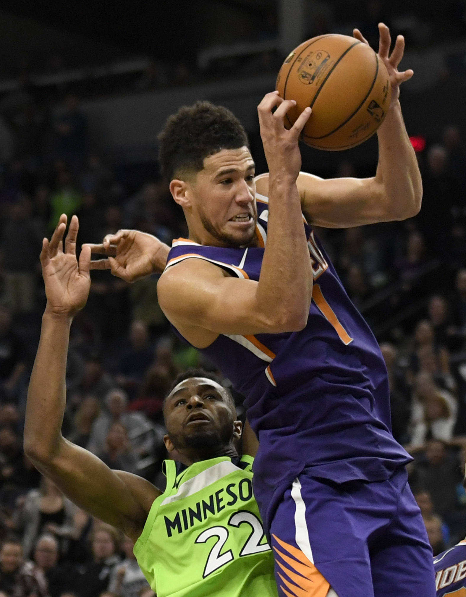 Booker scores 35 as short-handed Suns beat Wolves 100-98
