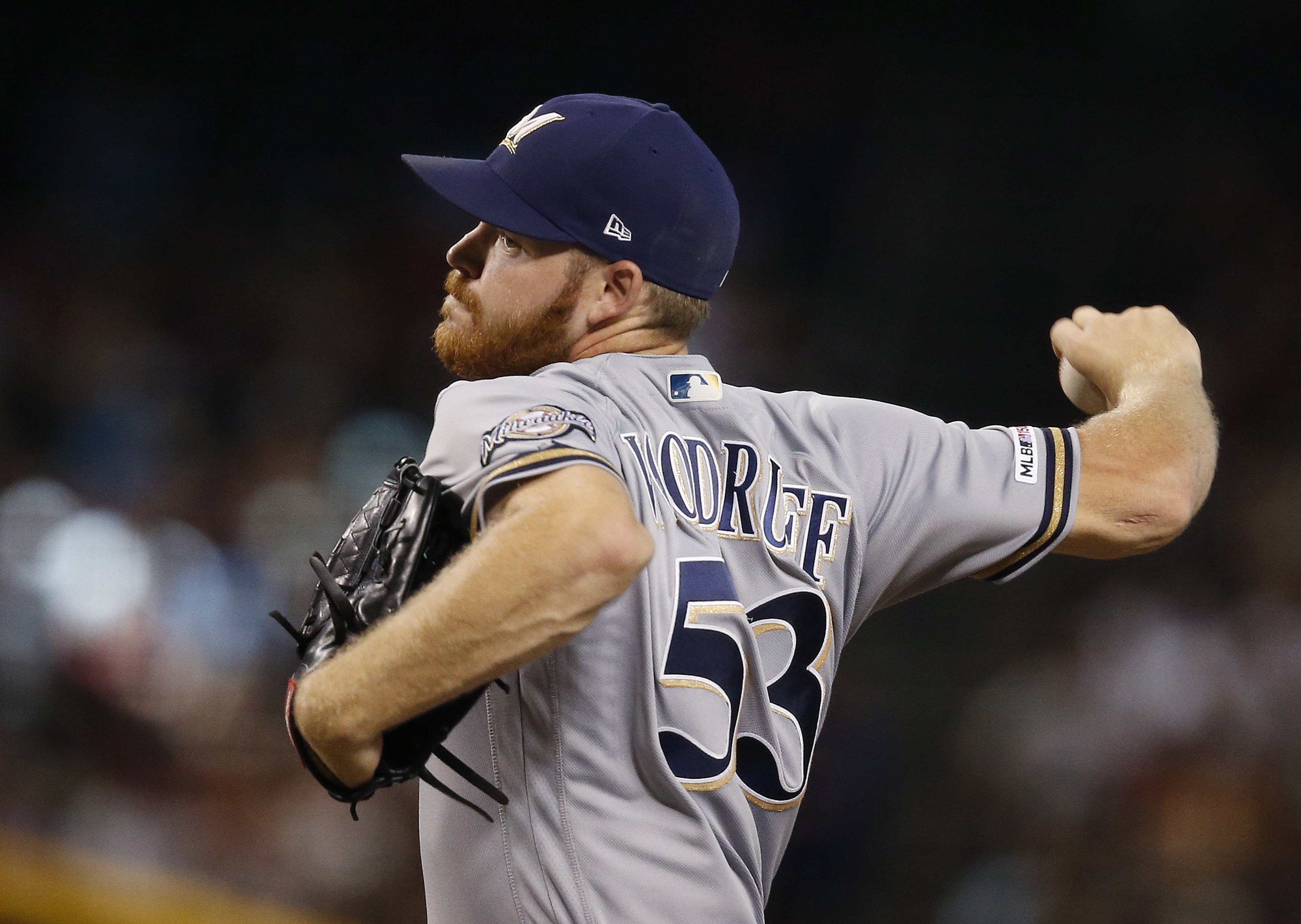 Brewers' Woodruff headed to injured list with oblique strain