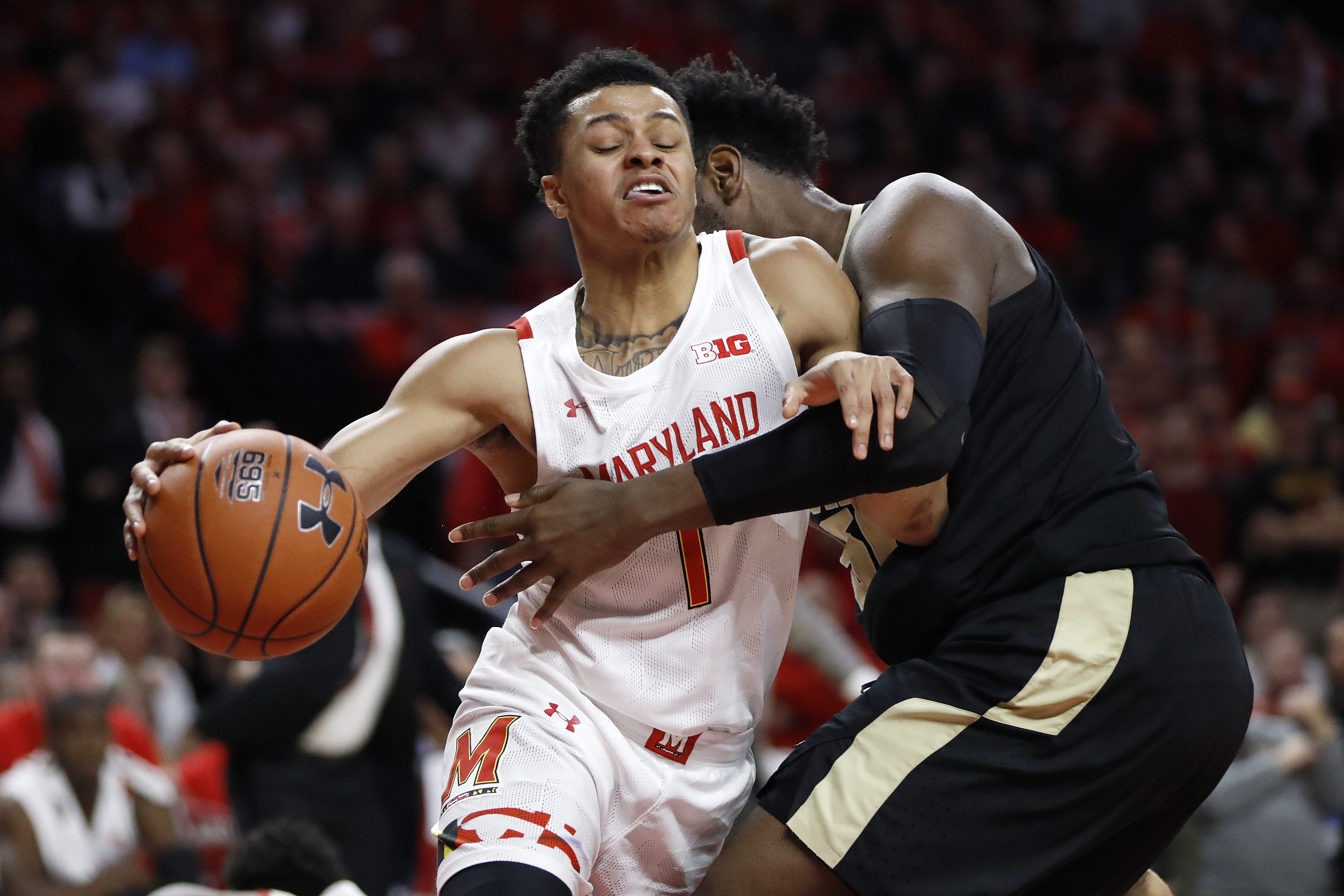 Smith scores 18 and No. 17 Maryland holds off Purdue 57-50