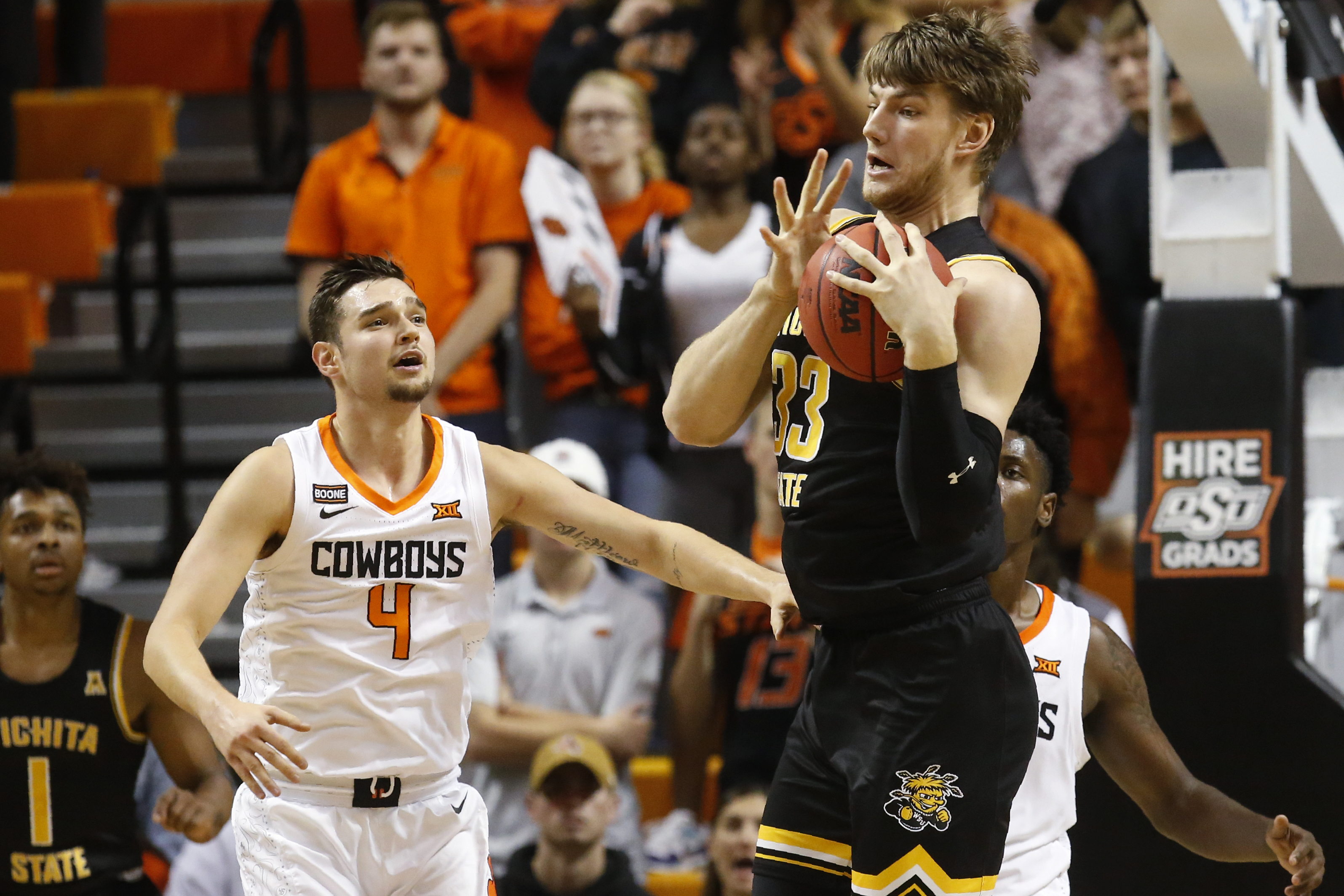 Etienne, hot shooting leads Wichita St. over Okla. St. 80-61