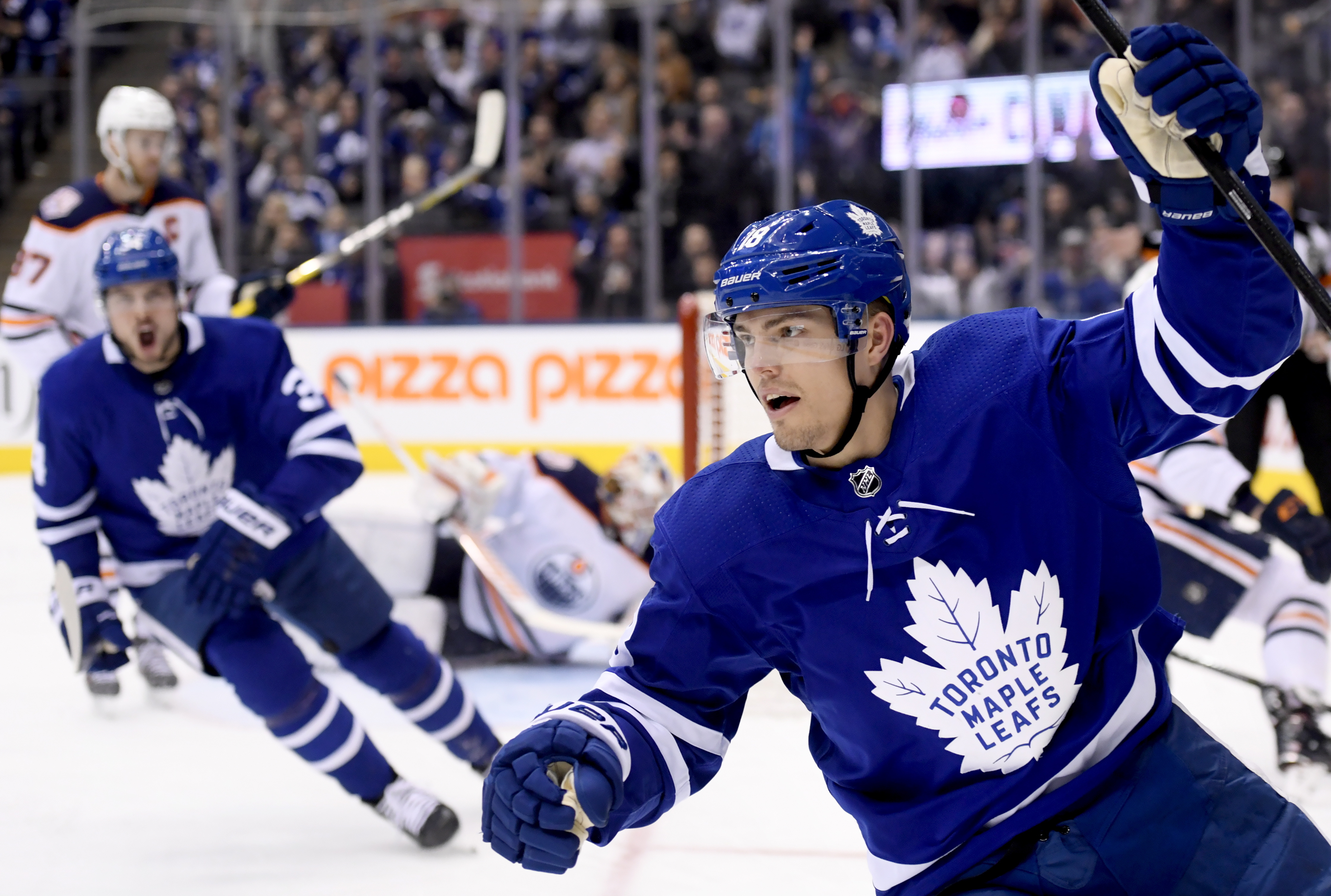 Johnsson scores twice, Leafs use 4-goal second to top Oilers