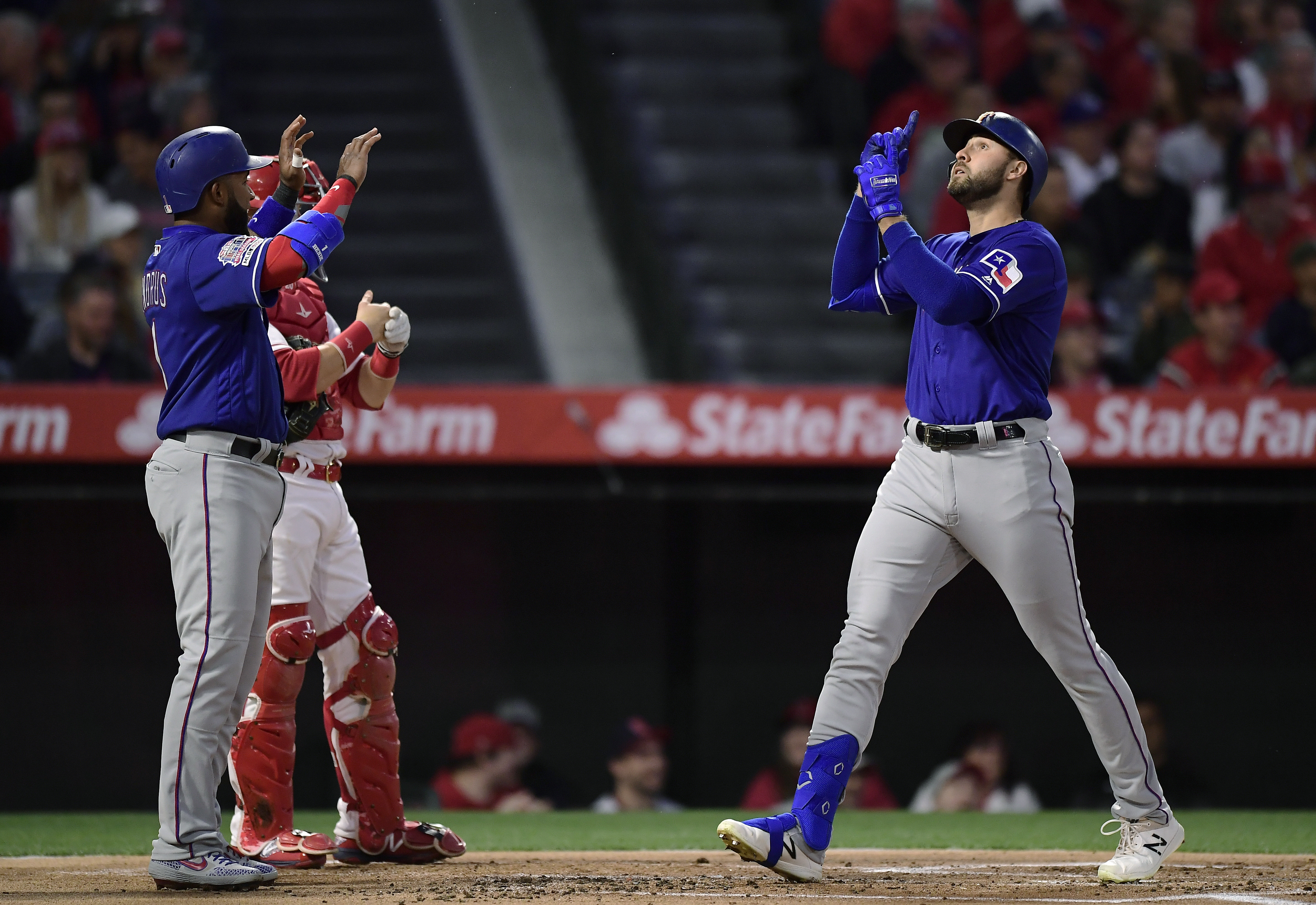 Rangers ride big 1st inning past struggling Angels, 11-4