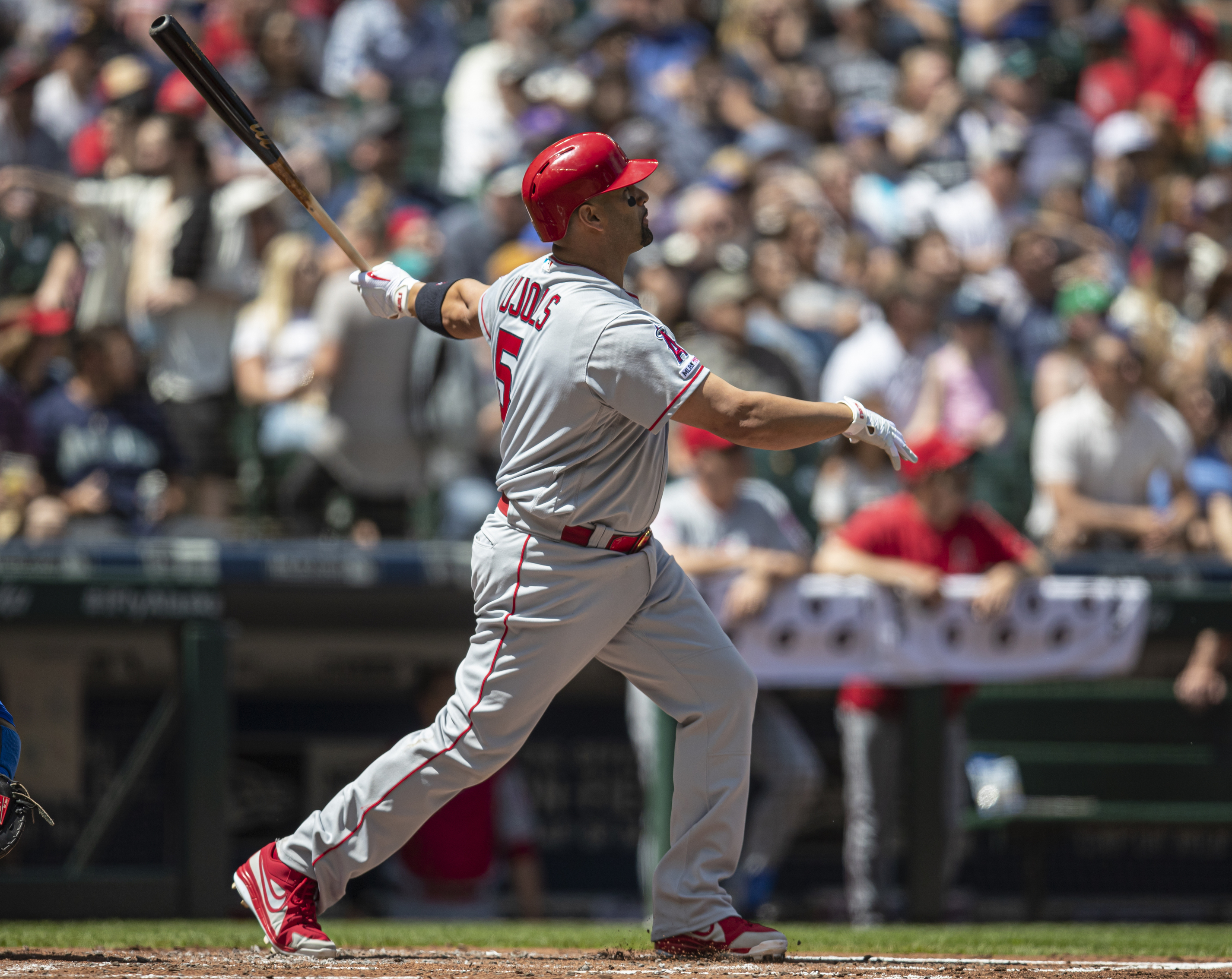 Pujols HR, Suarez wins in debut, Angels rout Mariners 13-3