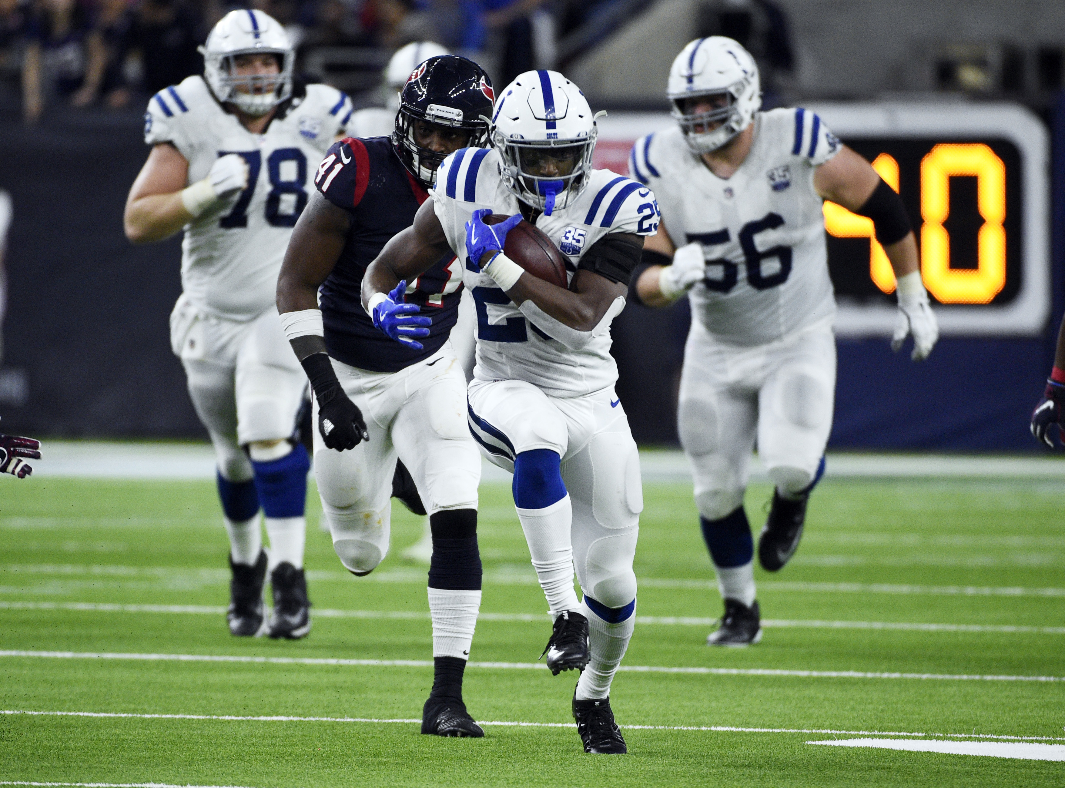 Colts off, running through playoffs with strong ground game