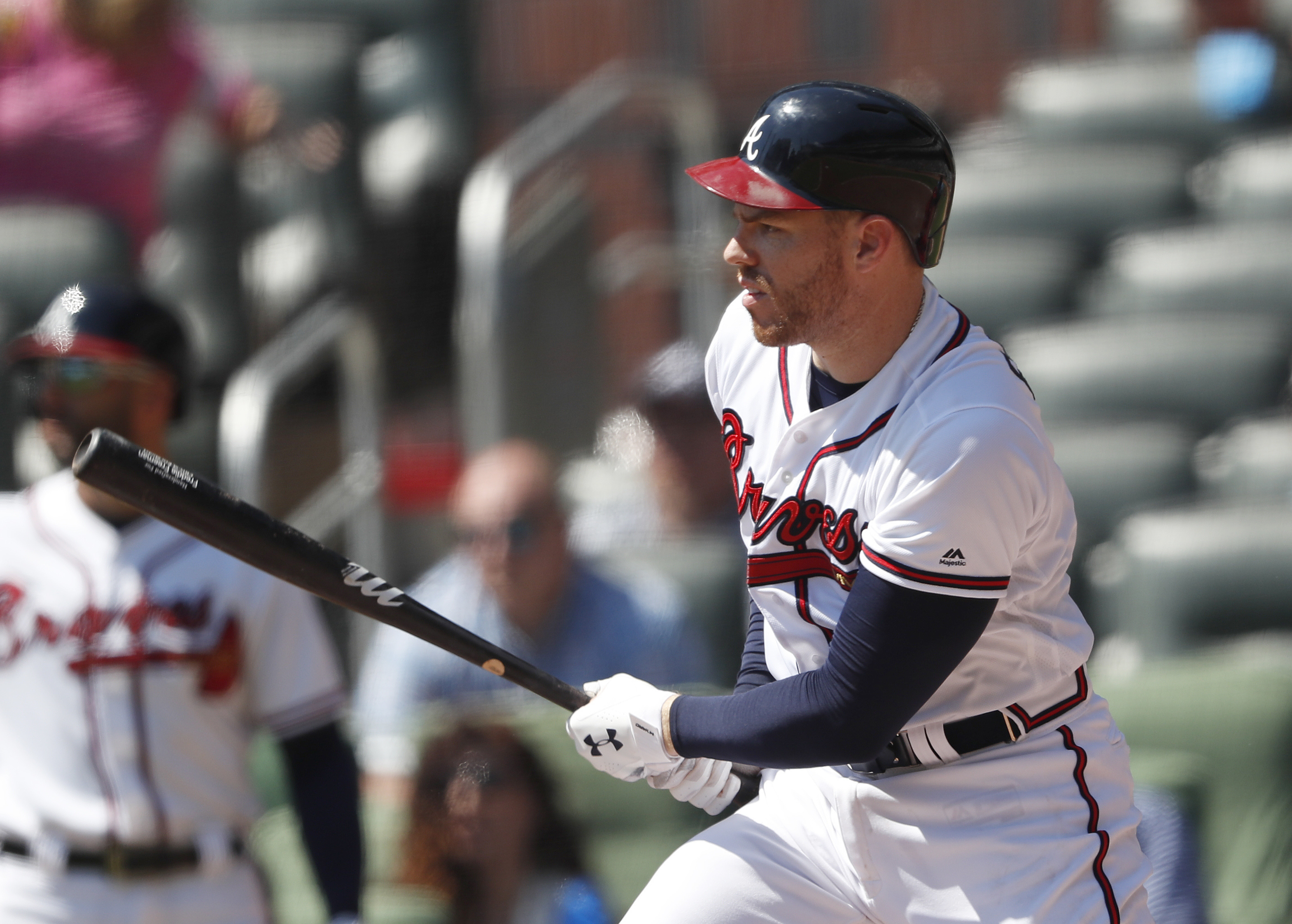 Freeman, Toussaint help Braves beat Cardinals 7-3