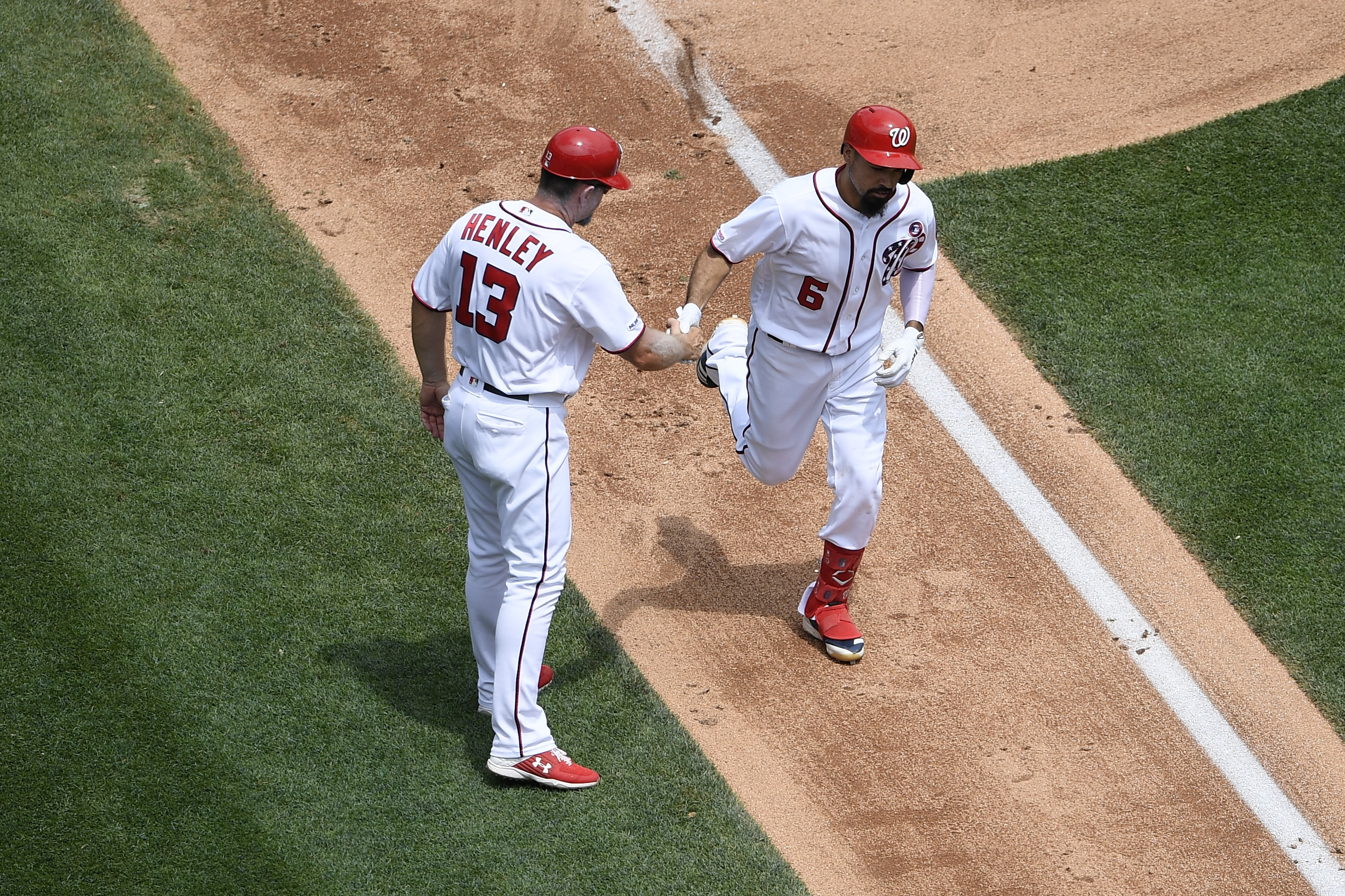 Rendon homers, red-hot Nationals complete sweep of Marlins