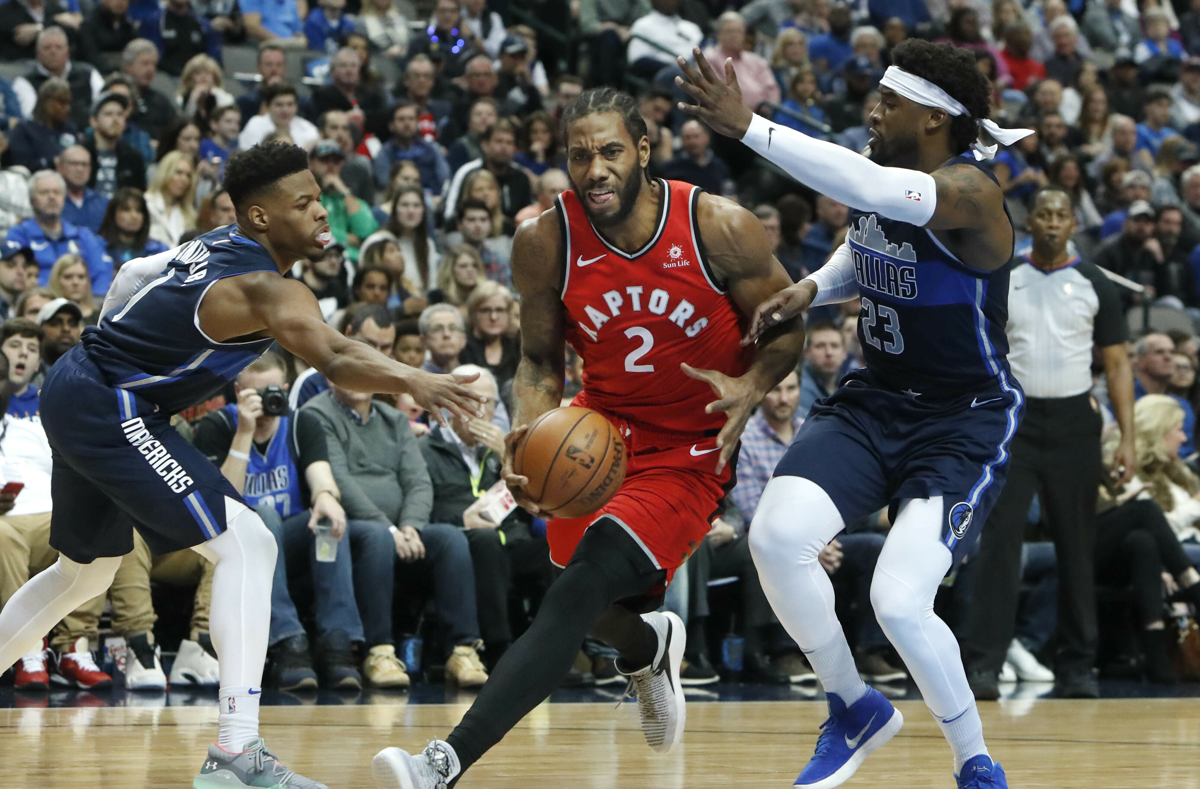 Leonard scores 33 as Raptors beat Doncic, Mavericks 123-120