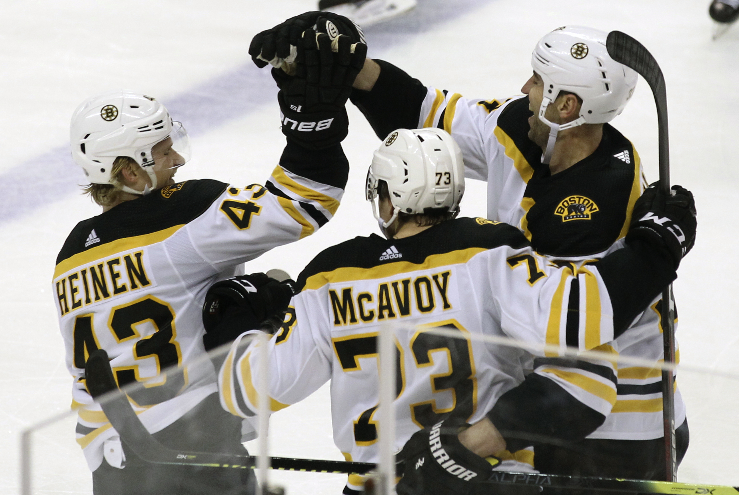 Bruins clinch playoff berth with 7-3 win over Panthers