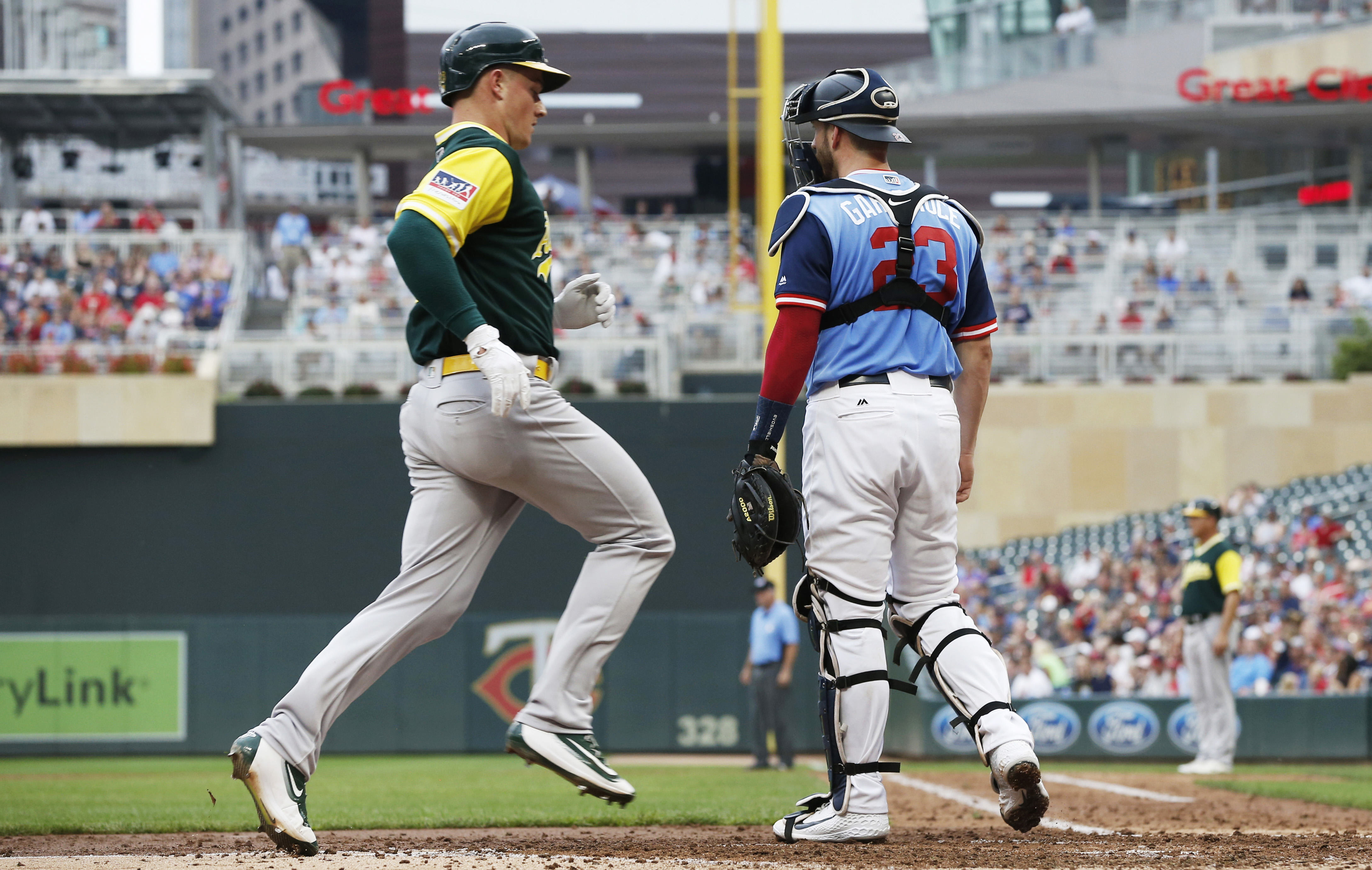 Chapman, Lowrie power A’s past Twins, 6-2