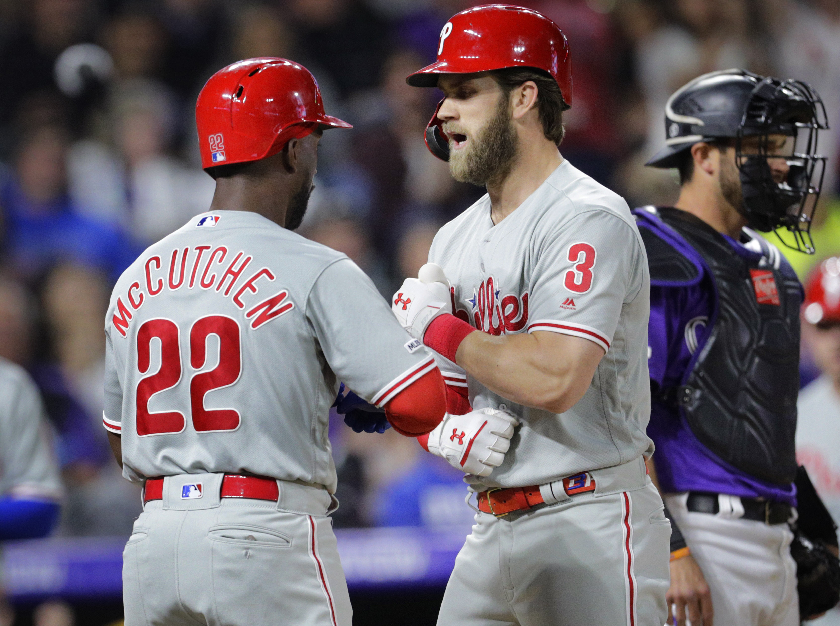 Phillies get HRs from Harper, McCutchen to beat Rockies 8-5