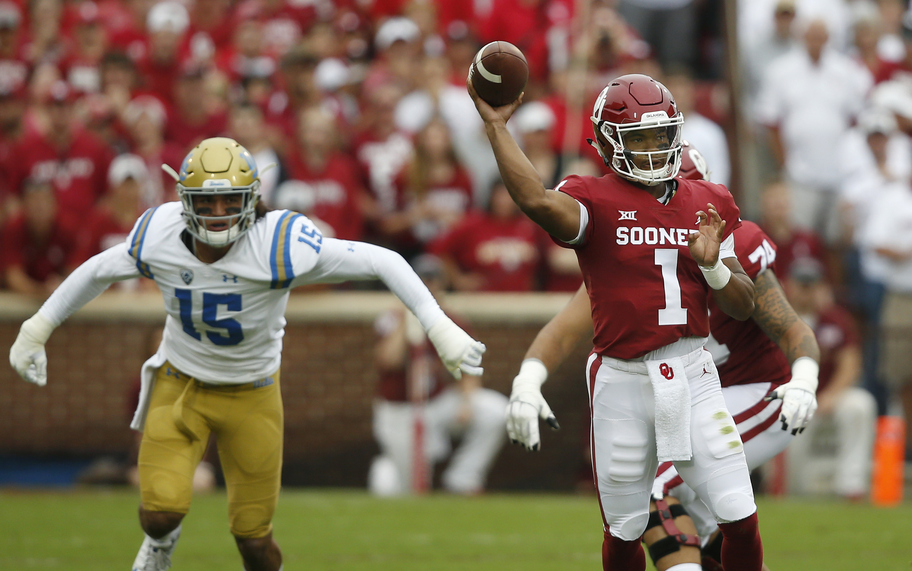 Murray’s 5 total TDs lead No. 6 Oklahoma past UCLA 49-21