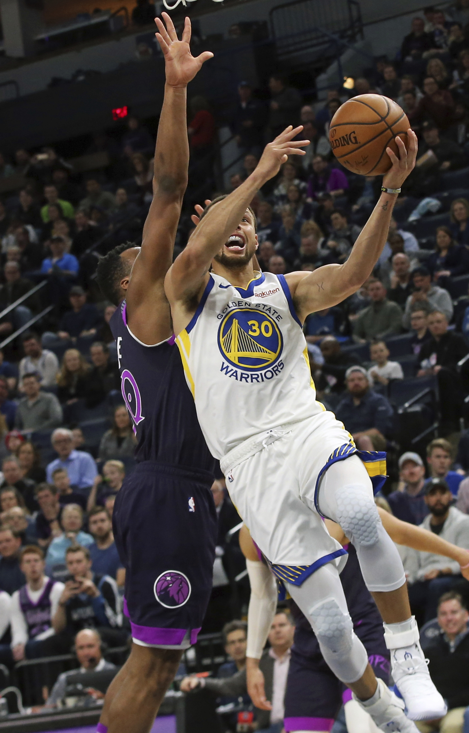 Warriors top Timberwolves 117-107, regain 1st in conference