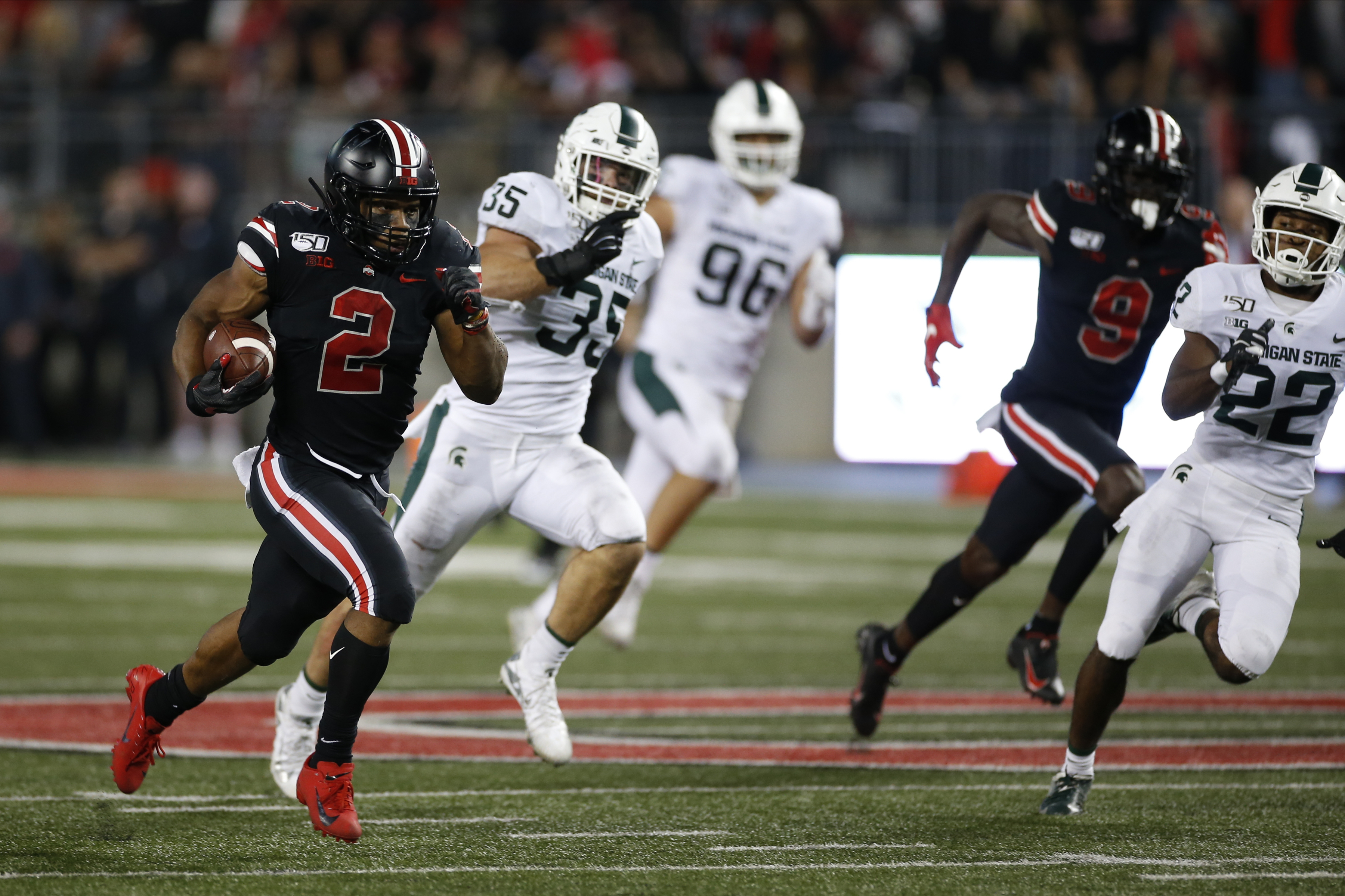 Fields, Dobbins lead No. 4 Ohio St over No. 25 Michigan St