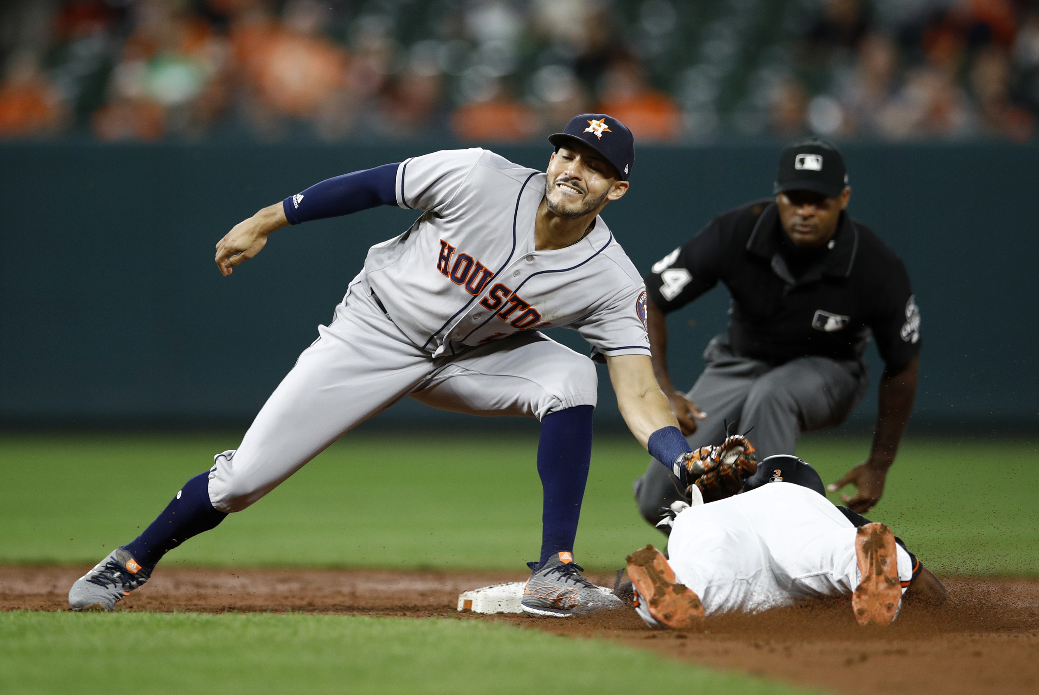 Cole tunes up for playoffs, helps Astros beat Orioles 2-1