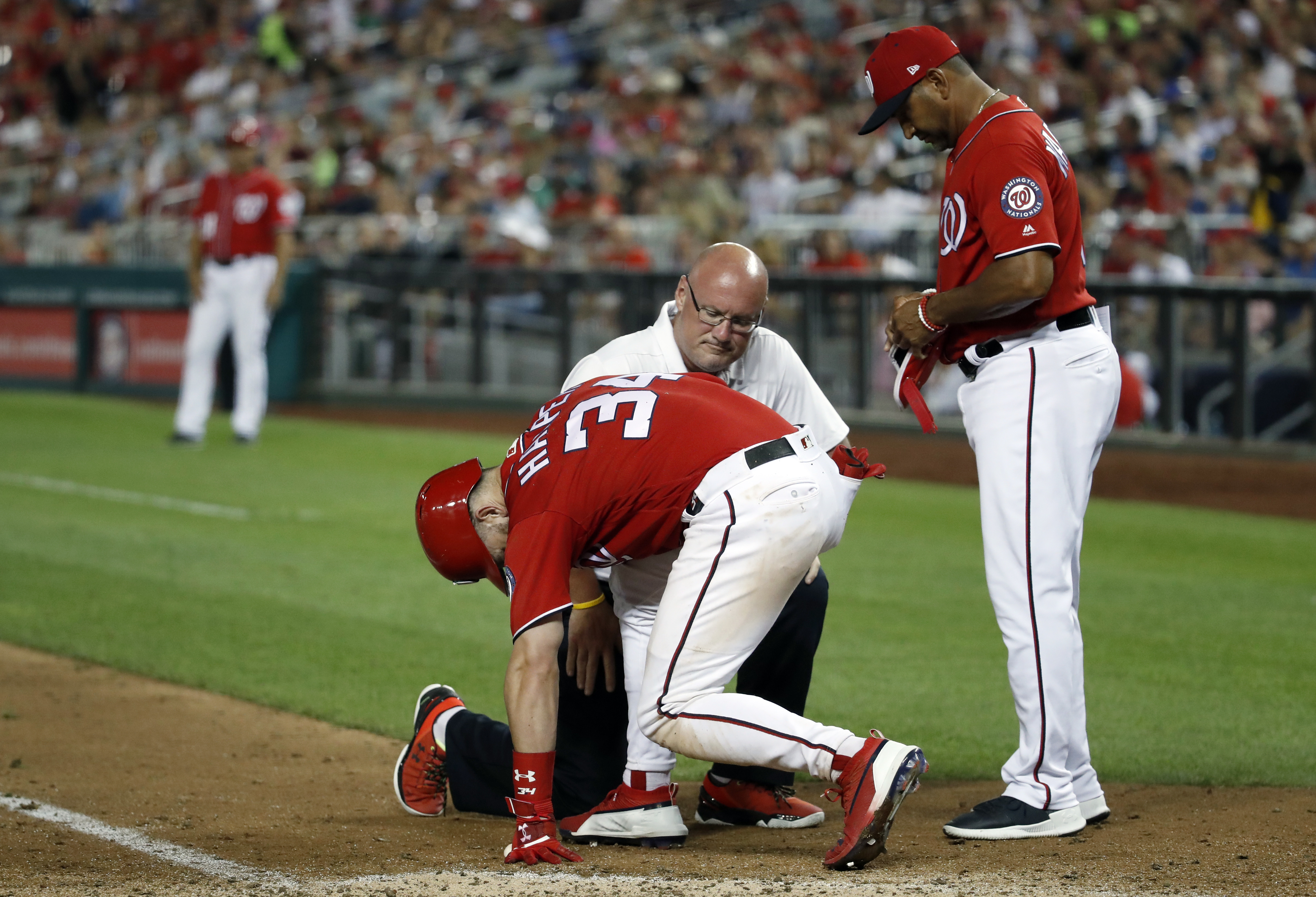 Bryce Harper pulled after being hit in knee by pitch