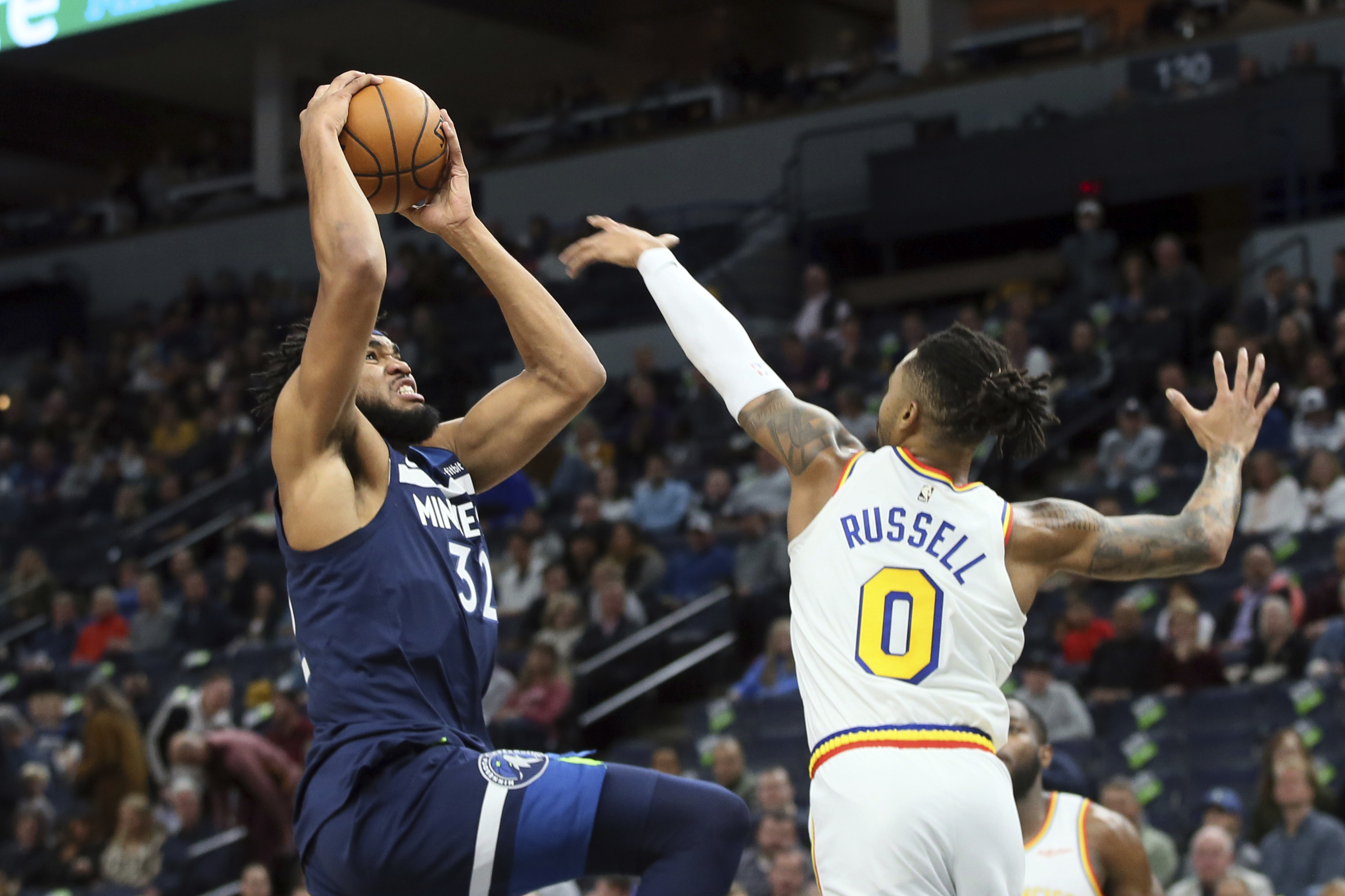 Timberwolves outlast Russell, Warriors, 125-119 in OT