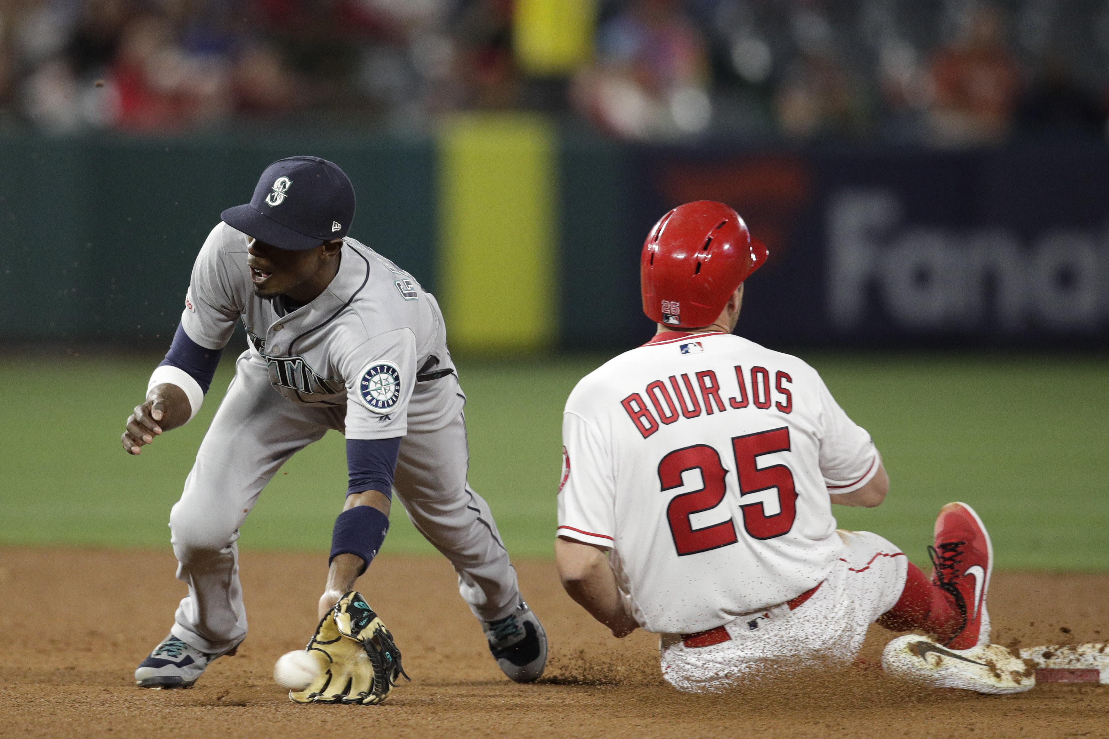 Mariners blow 8-run lead, rally for 11-10 win over Angels