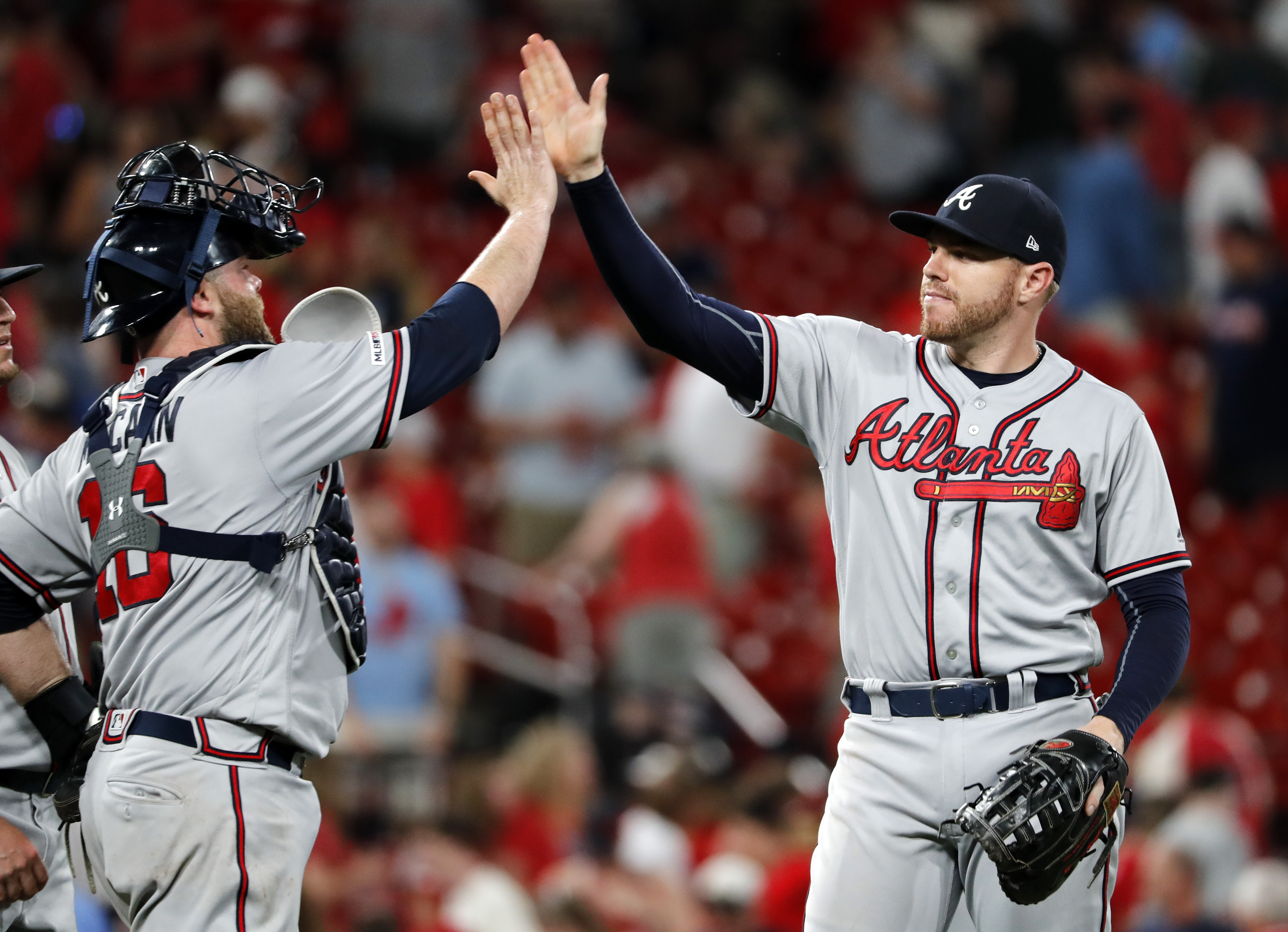 McCann’s bases-loaded walk lifts Braves past Cardinals in 10