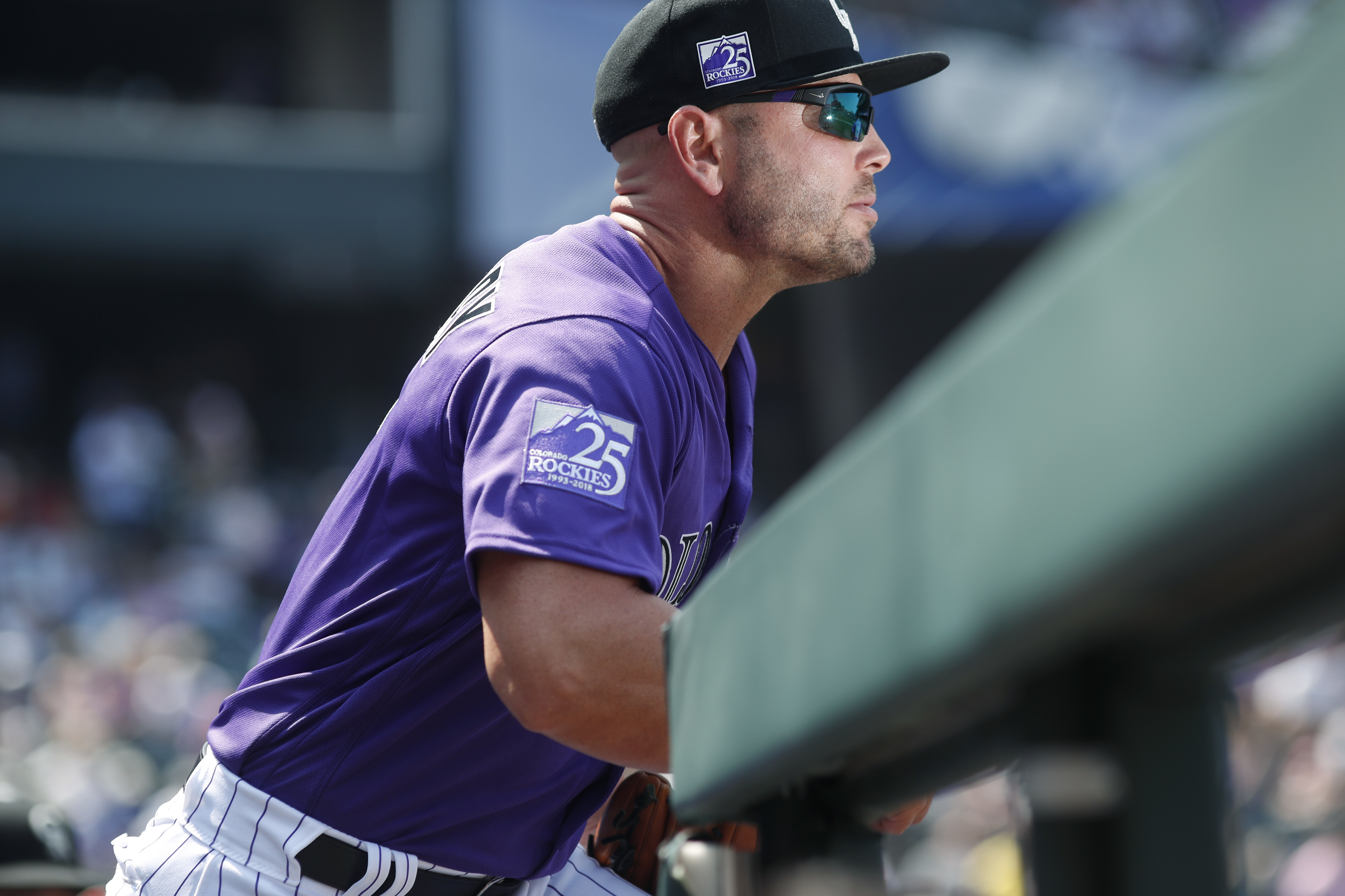 LEADING OFF: Holliday rejoins Rockies, Moreland hurts knee