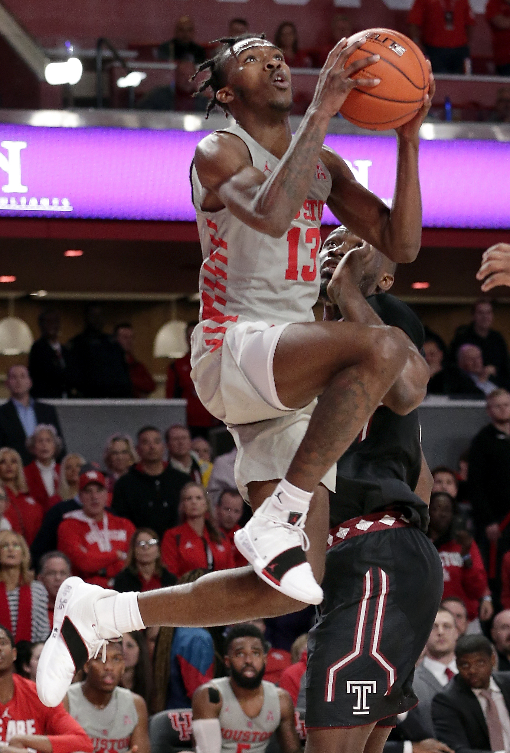 No. 13 Houston beats Temple 73-66 to avenge lone loss