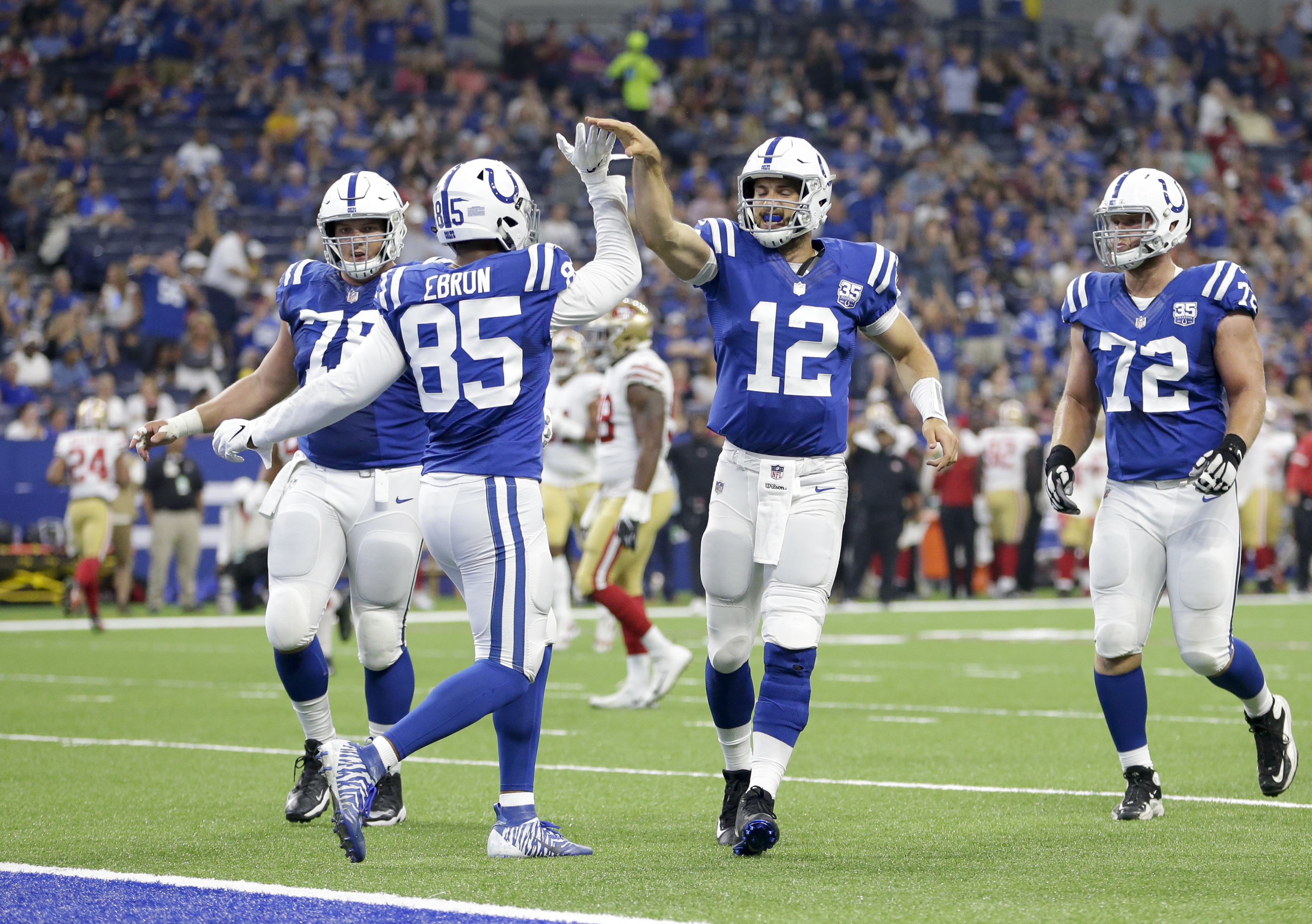 Luck’s sharper touch helps lead Colts past 49ers 23-17