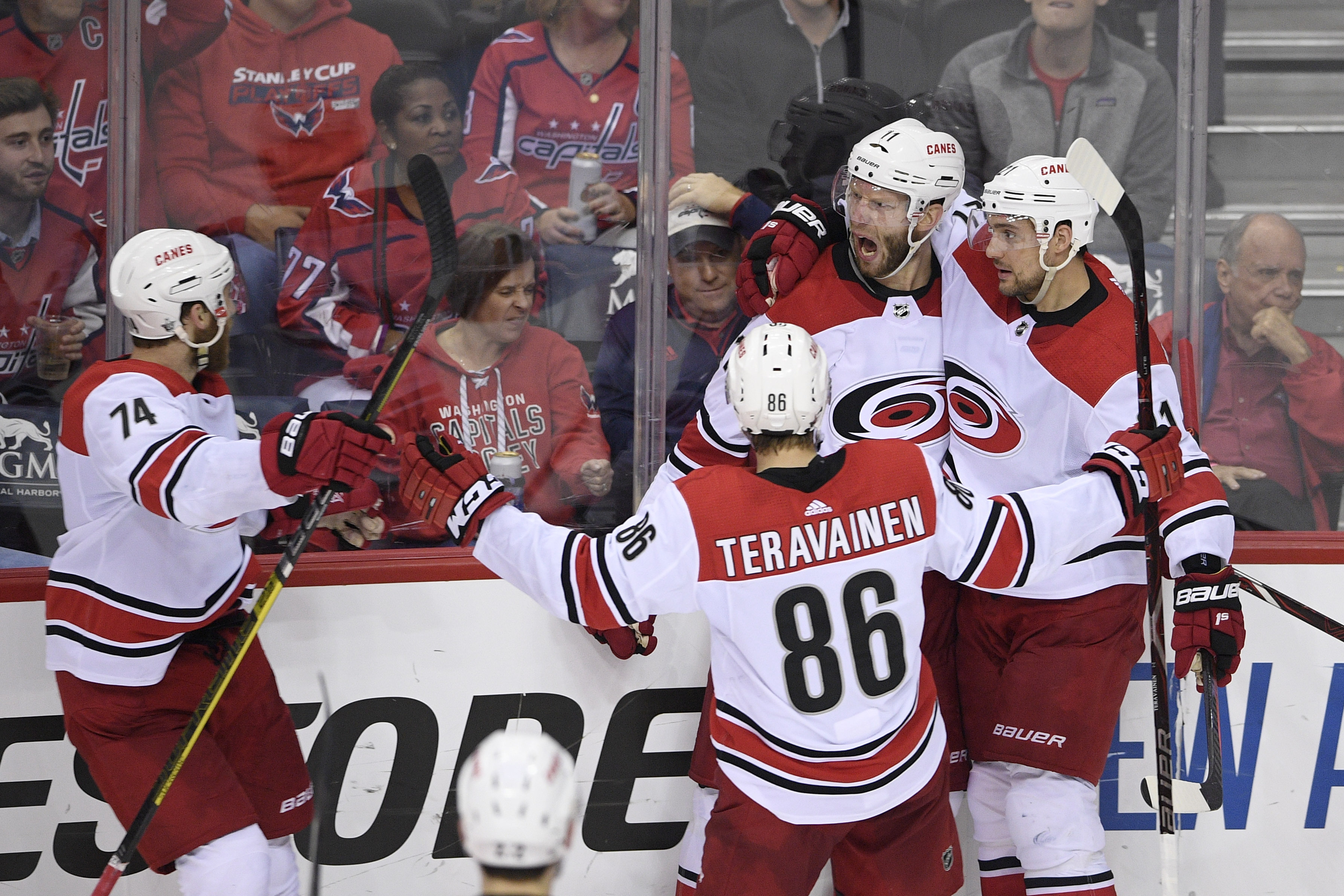 Hurricanes stun defending champion Capitals in 2OT in Game 7