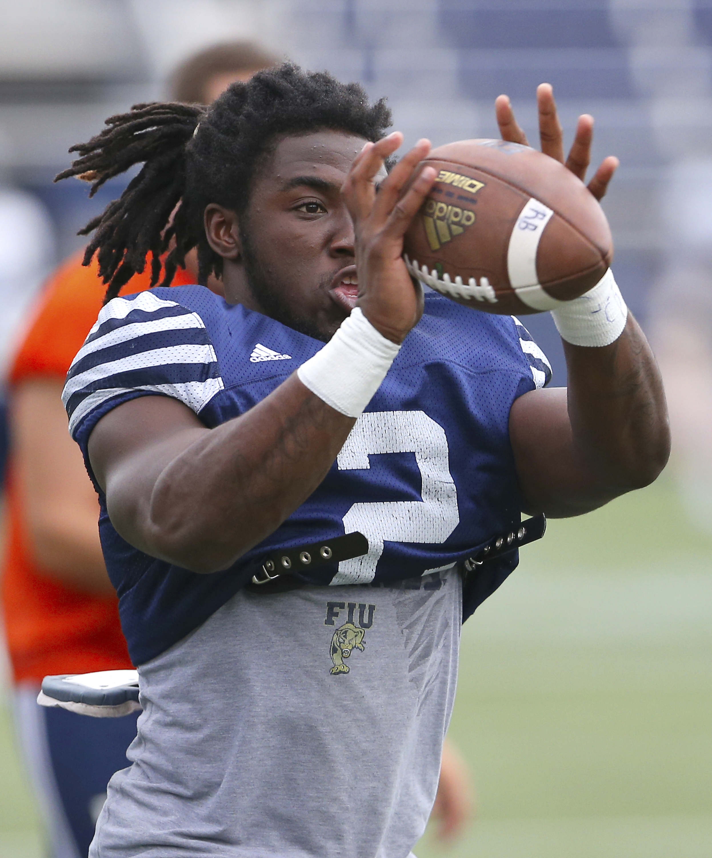 Anthony Jones rushes for 3 scores, FIU beats Toledo 35-32