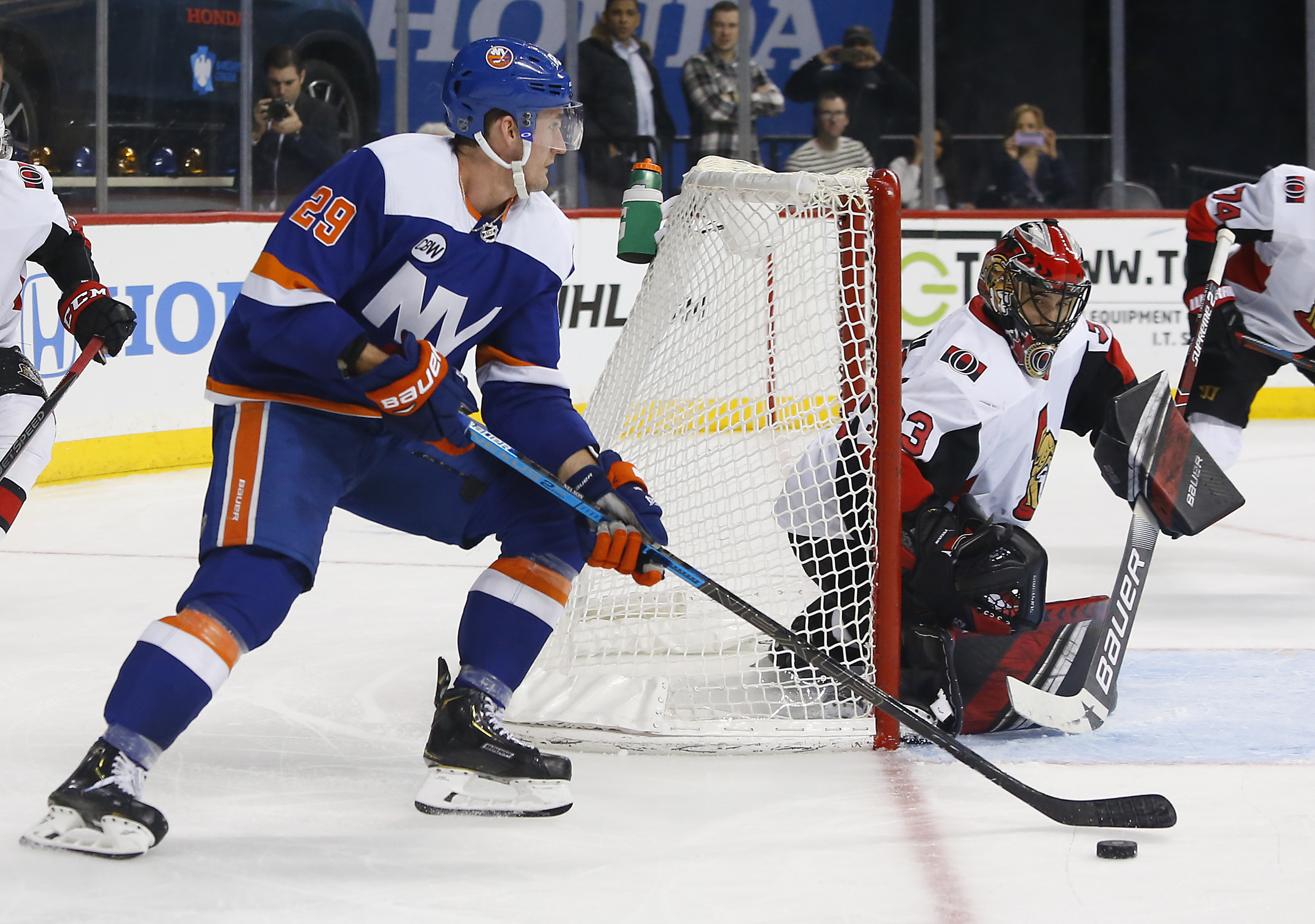 Barzal helps Islanders rally for 6-3 win over Senators
